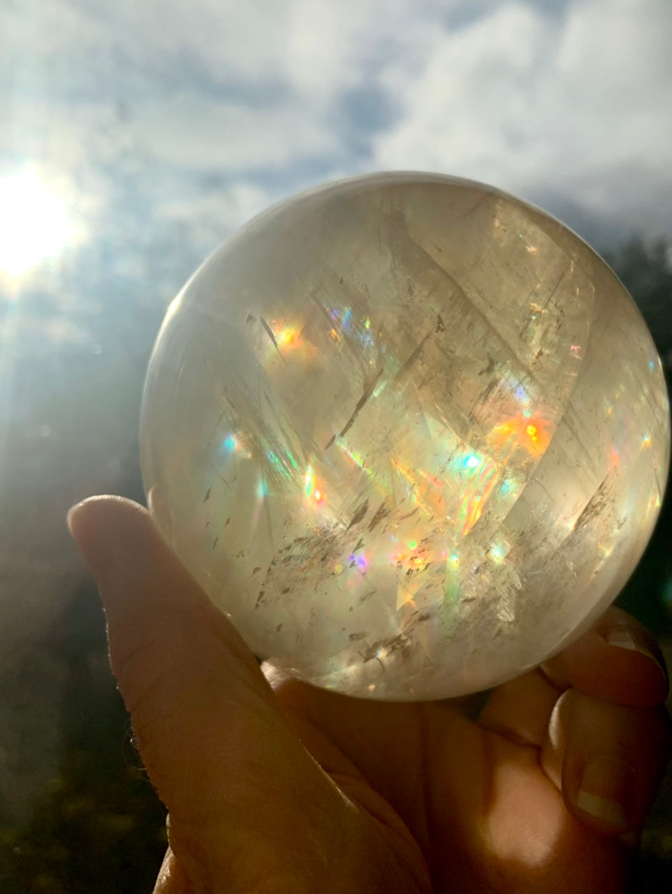 Honey Calcite crystal sphere with natural rainbow inclusions for Solar Plexus Chakra healing and manifestation
