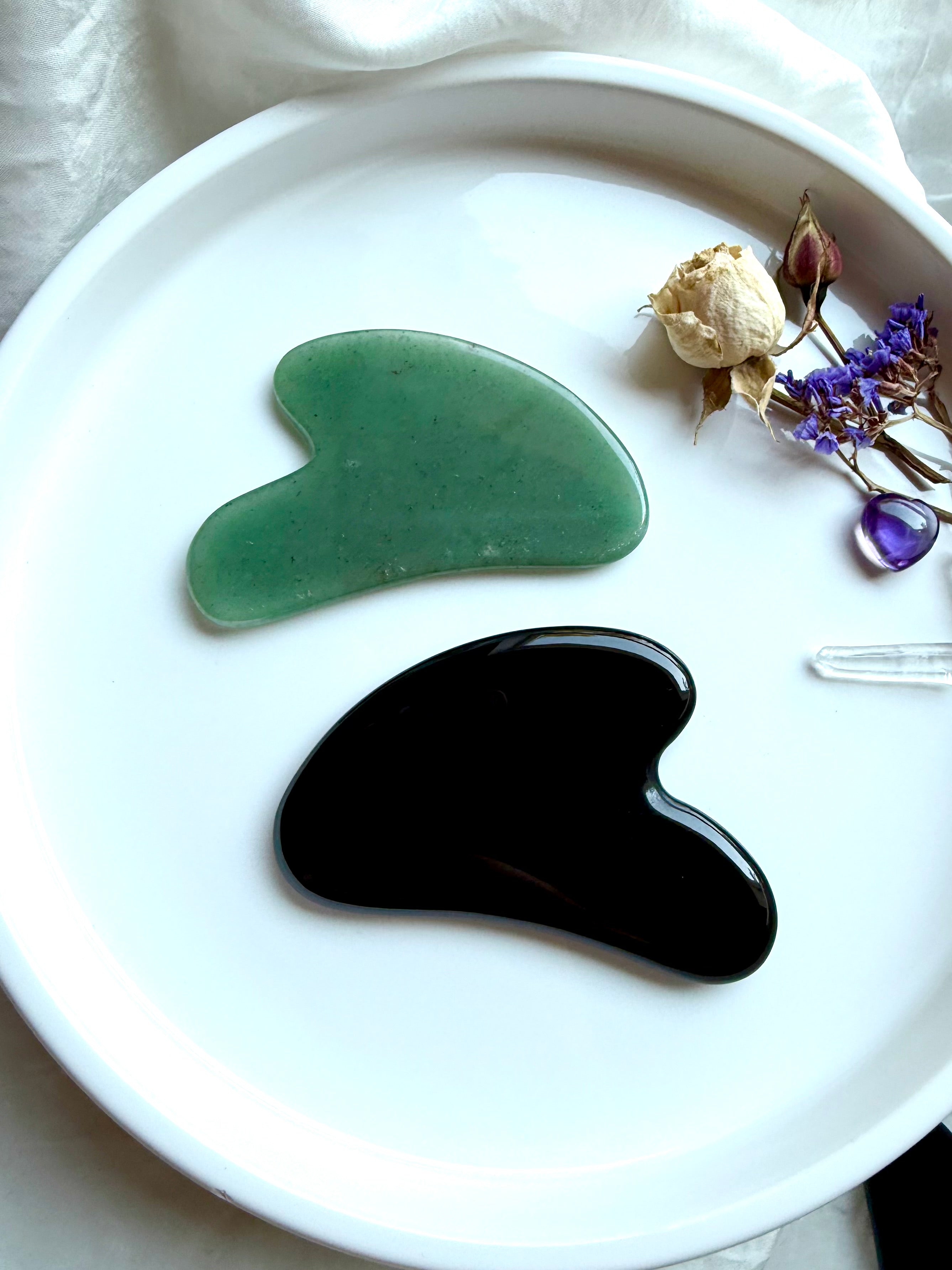 Green Aventurine and Black Obsidian crystal gua sha facial massage tools – curved contour design for skincare, energy healing & beauty rituals