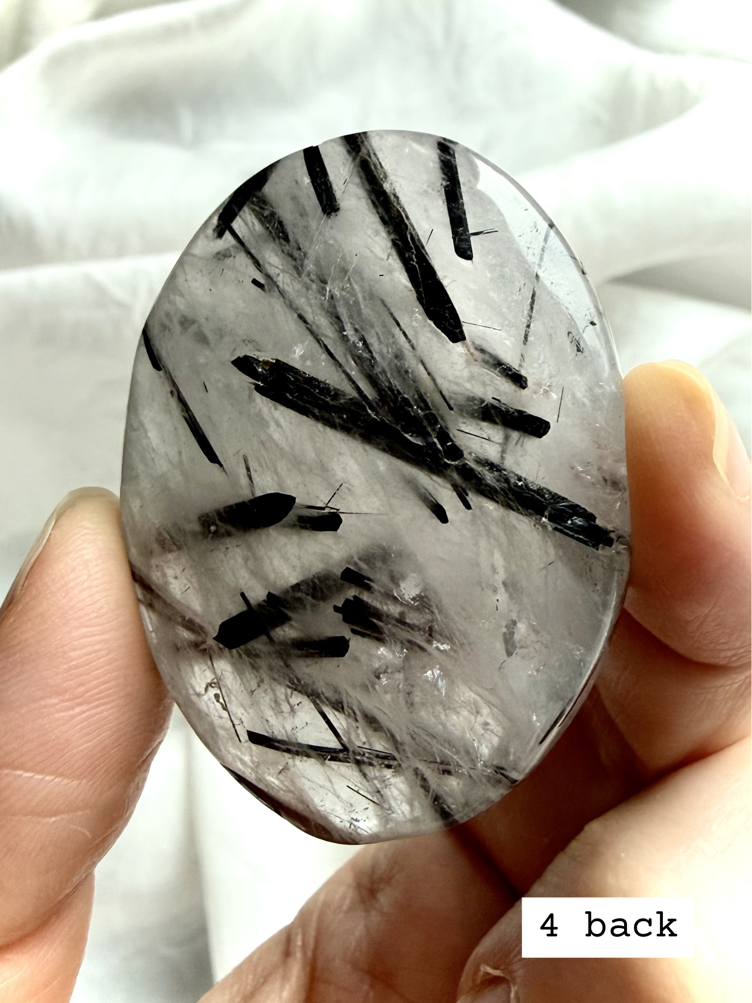 Black Tourmaline in Quartz palm stone 4 back view natural quartz with tourmaline inclusions