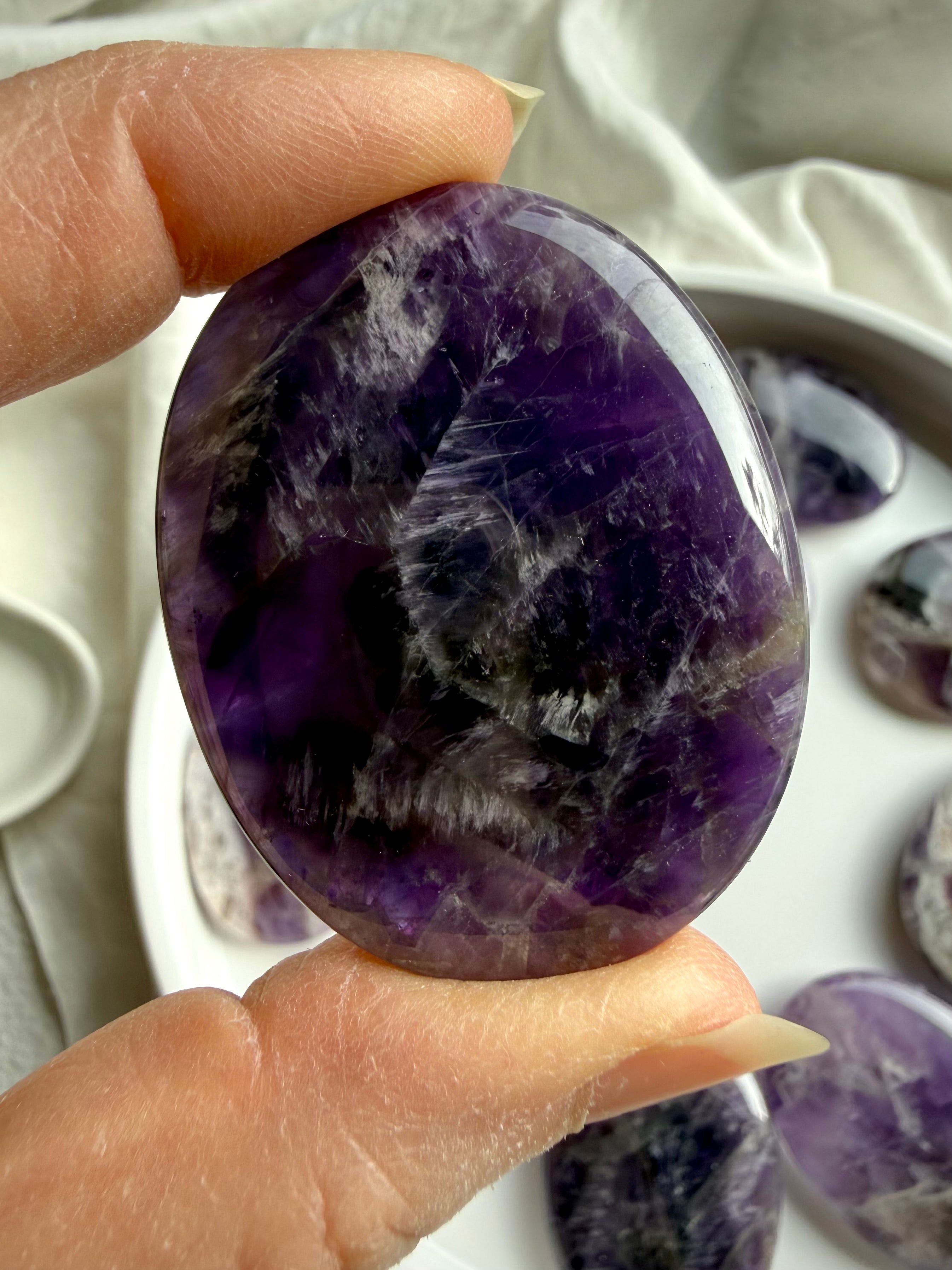 smooth flat purple amethyst palm stone for meditation and daily grounding