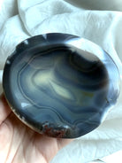 Polished Orca Agate crystal bowl showing natural banded patterns and subtle druzy — grounding stone for protection and sacred offerings.