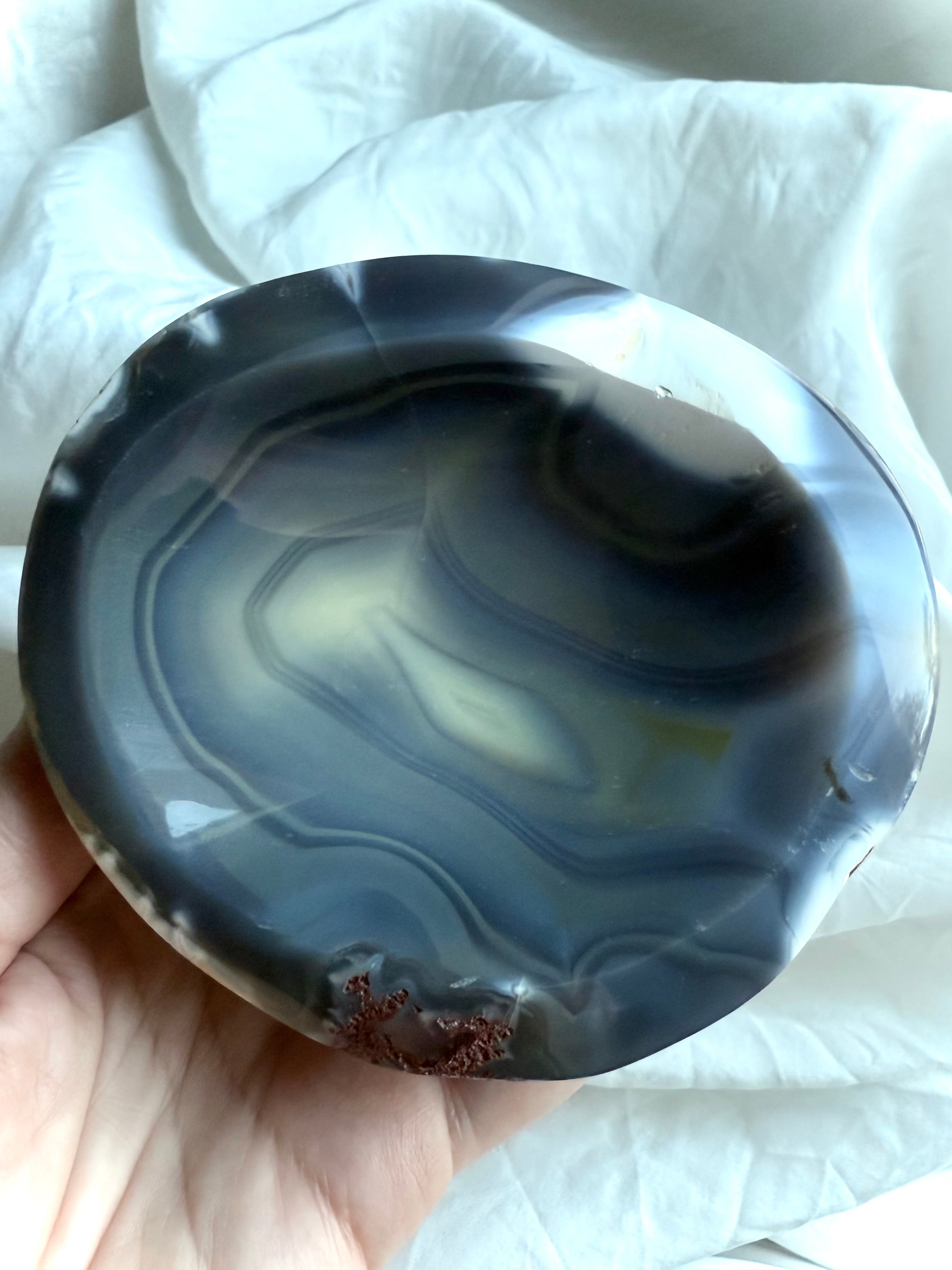 Polished Orca Agate crystal bowl showing natural banded patterns and subtle druzy — grounding stone for protection and sacred offerings.