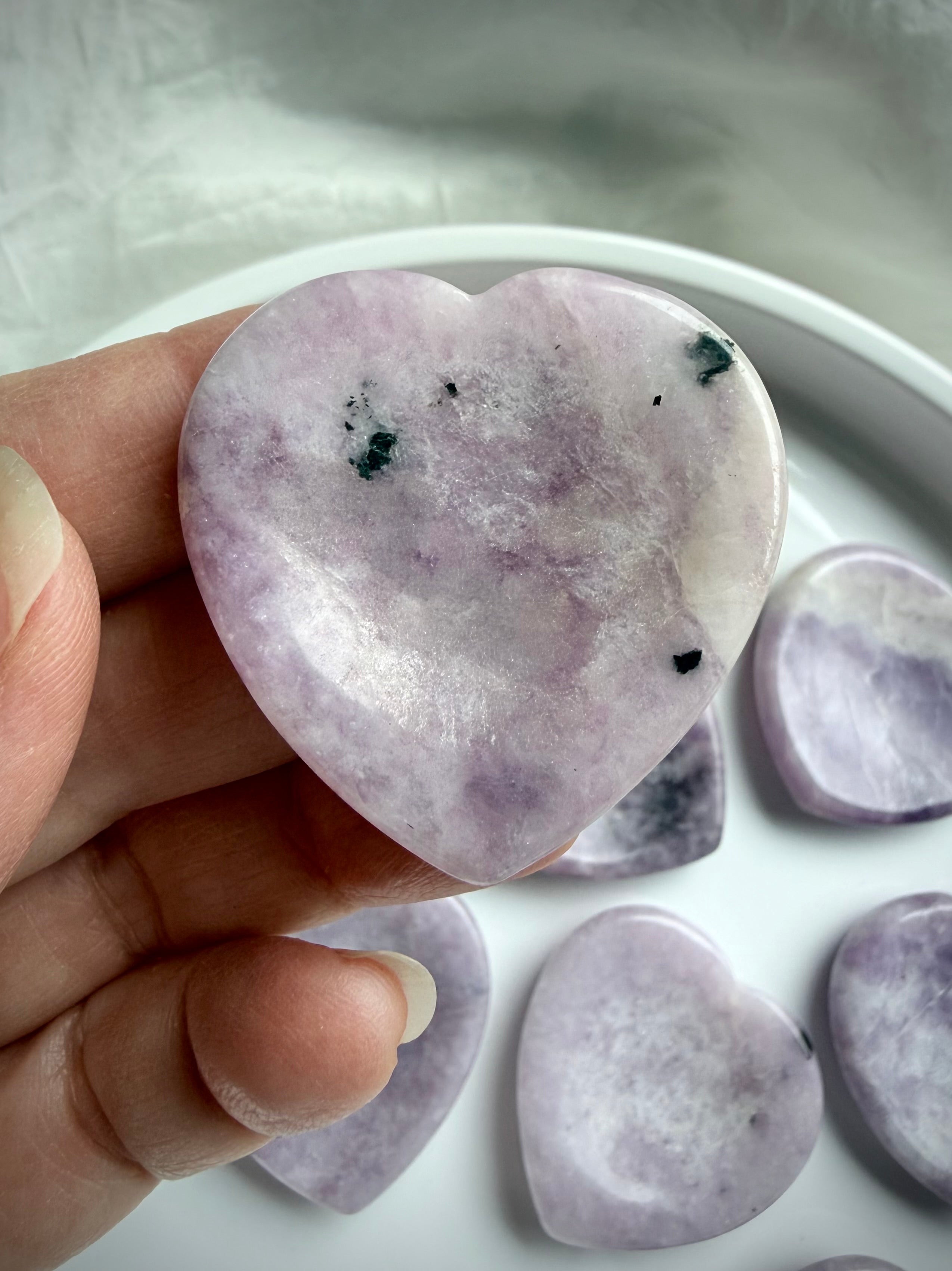 Lepidolite heart worry stone with smooth thumb indentation polished crystal