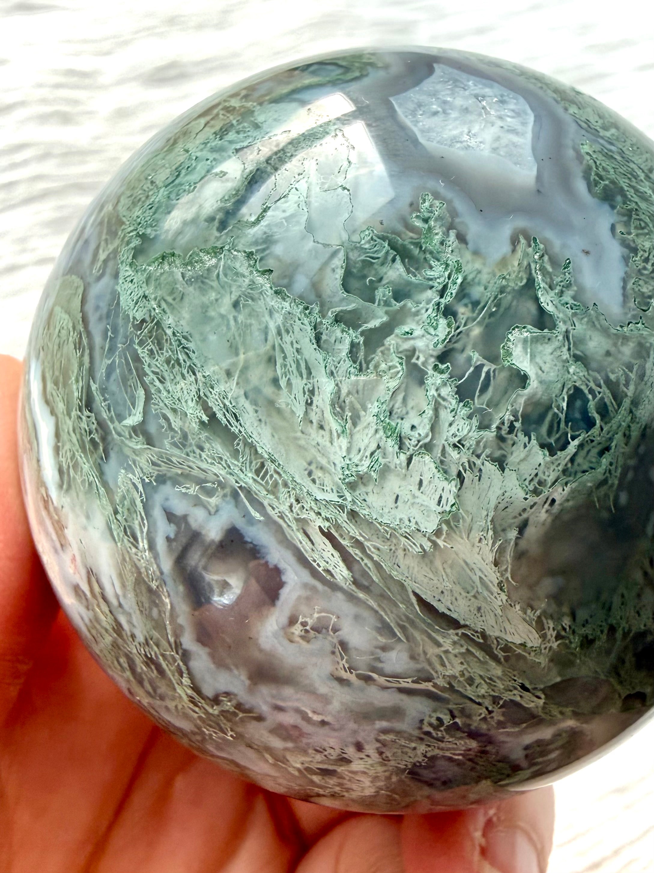 Lacy Moss Agate sphere with pale mint dendrites, Quartz inclusions and natural agate banding