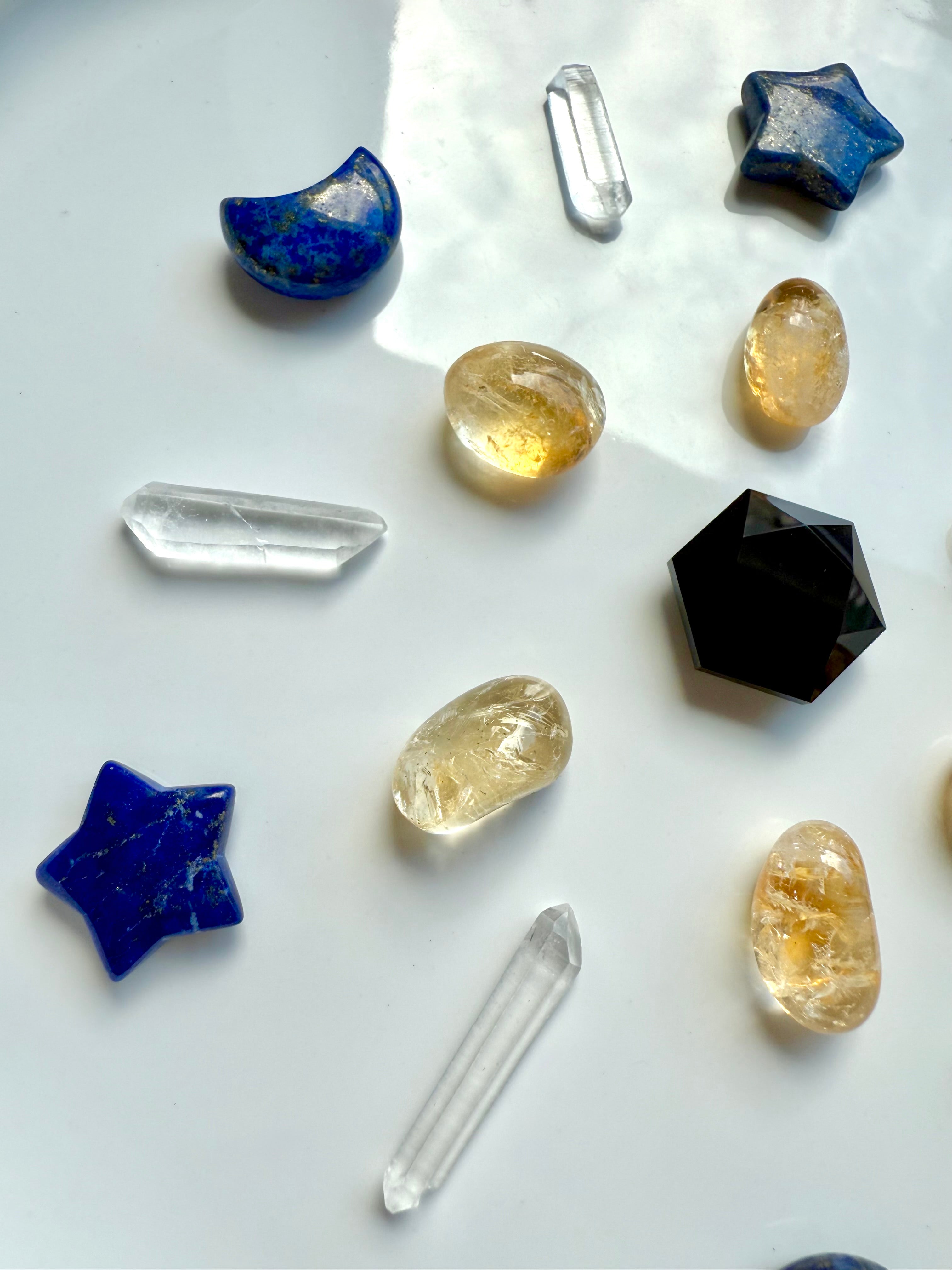 Deep blue Lapis Lazuli moons and stars – celestial carvings for altar or crystal grid