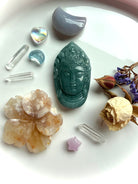 Blue Water Jade Quan Yin pendant carving styled with crystals and altar stones