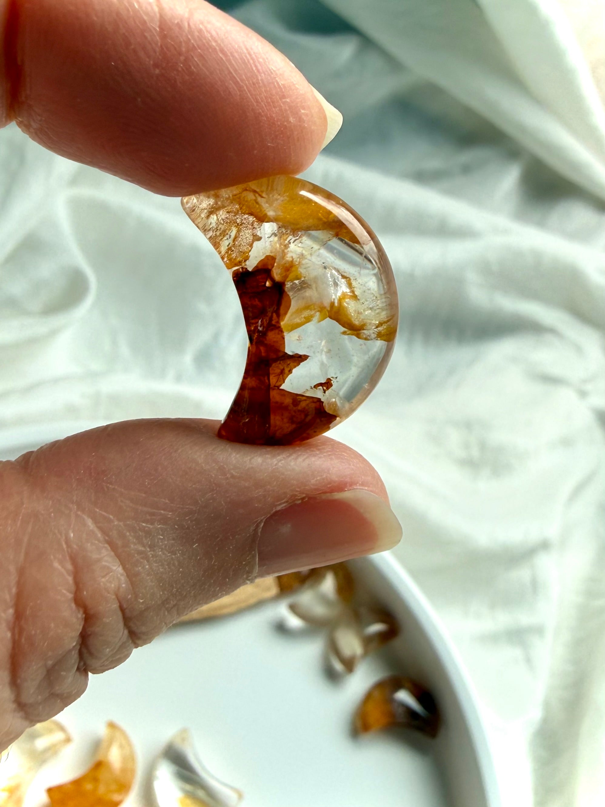 Small Golden Healer Quartz crescent moon crystal for energy healing, grids, and sacred spaces
