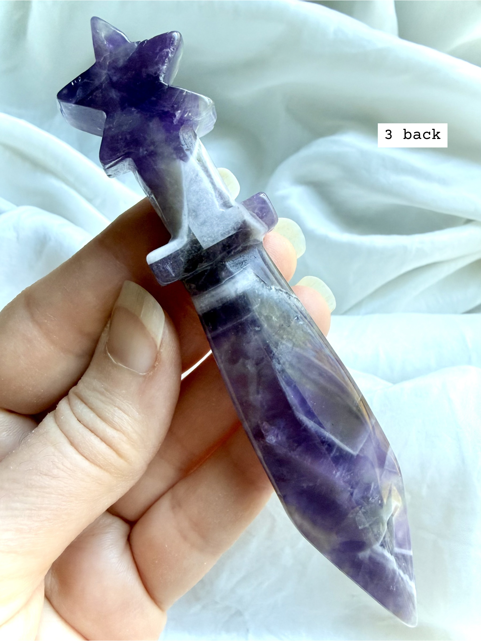 Back view of Dream Amethyst crystal athame with polished violet crystal patterning