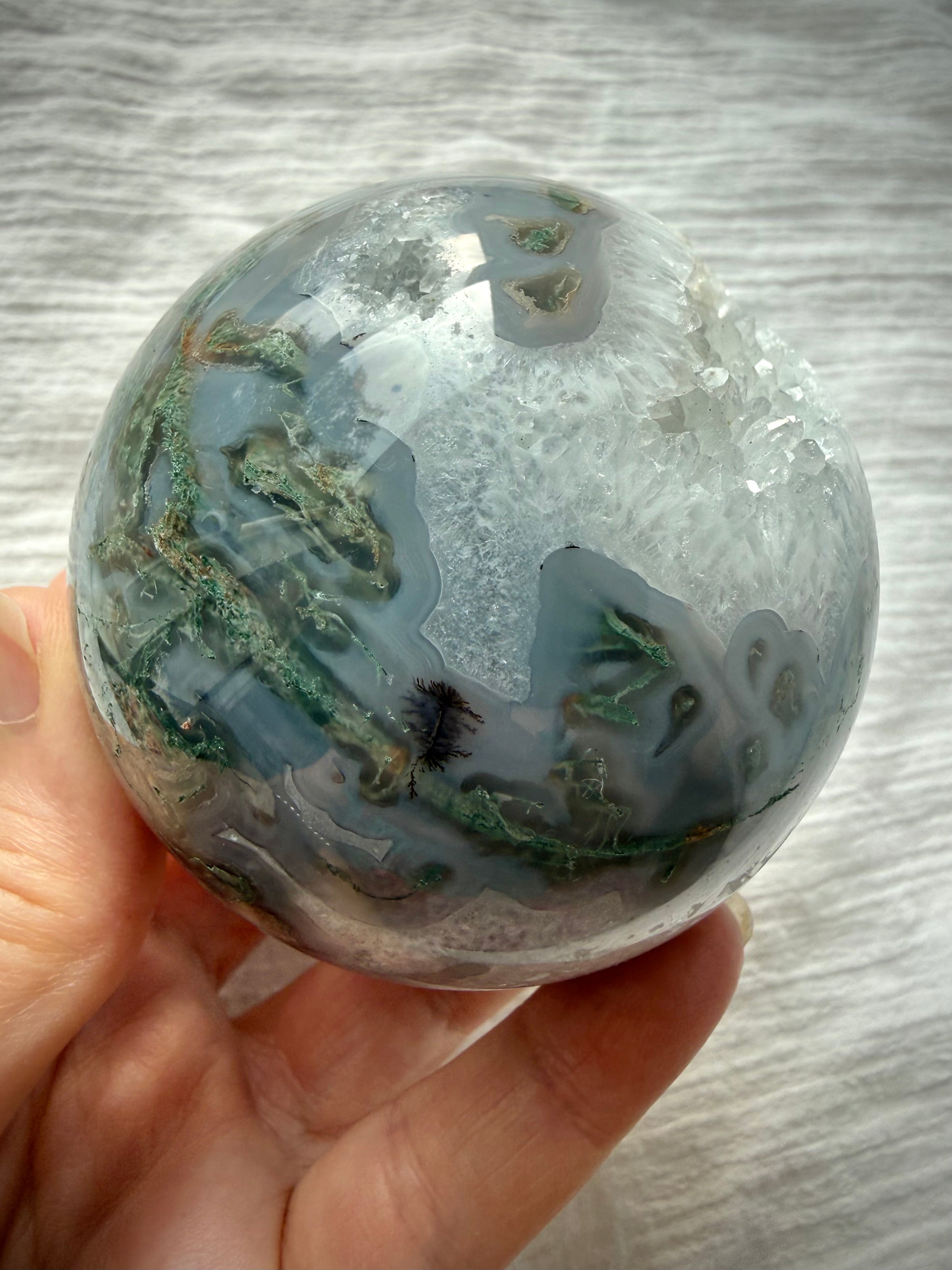 Moss Agate sphere with pale mint and deep green dendritic inclusions, translucent chalcedony and natural crystal patterns