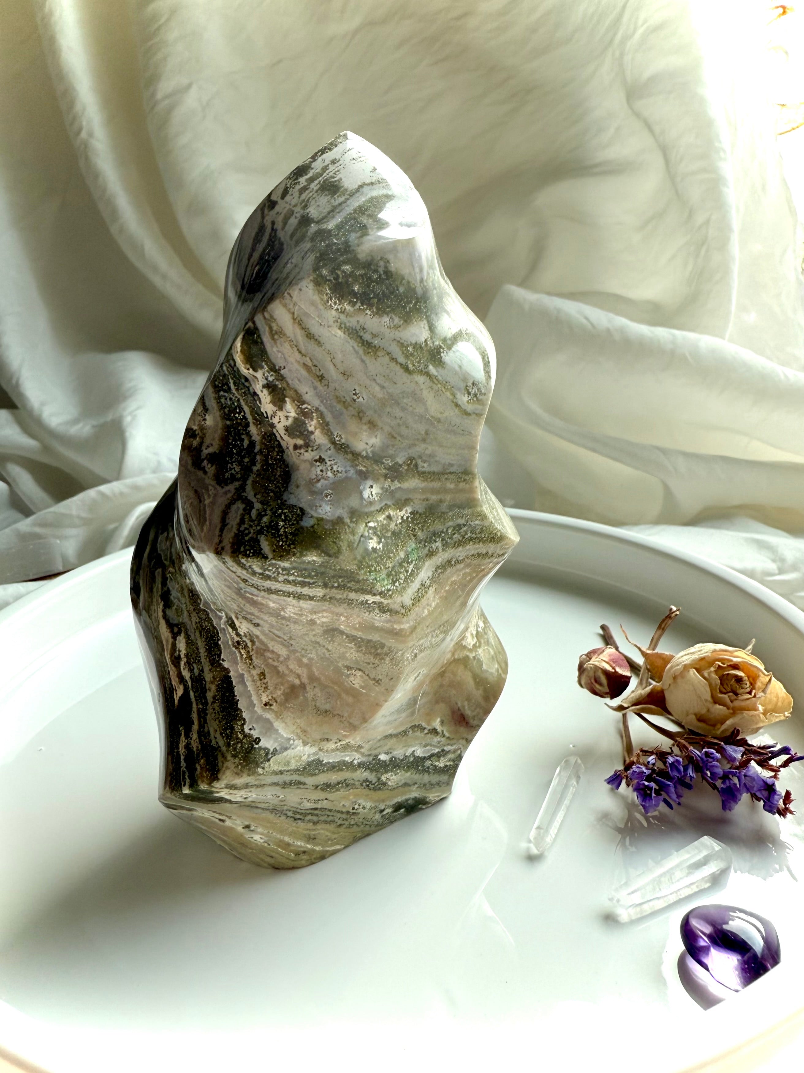 Standing Green Ocean Jasper flame with flowing moss-green bands and polished freeform curves, Earth-energy crystal for grounding and harmony.