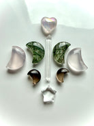 Celestial crystal grid with Smoky Quartz moons, Clear Quartz, Rose Quartz, Green Rutilated Quartz and Aura Rose Quartz heart