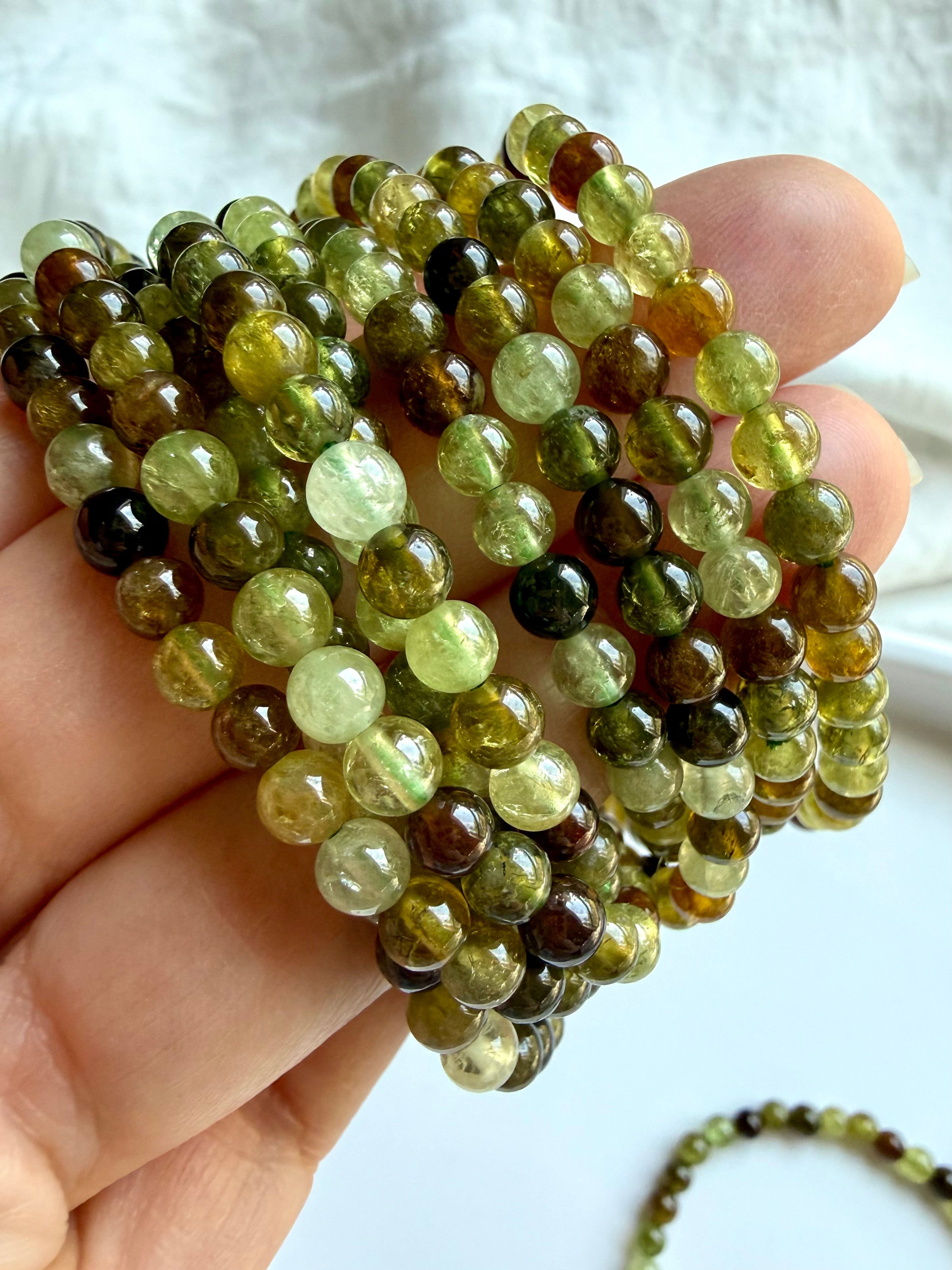 Tsavorite Garnet gemstone bracelets for abundance, vitality, confidence, and Heart Chakra healing
