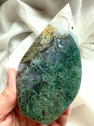 One of a kind Moss Agate flame carving with natural green inclusions and glossy polish