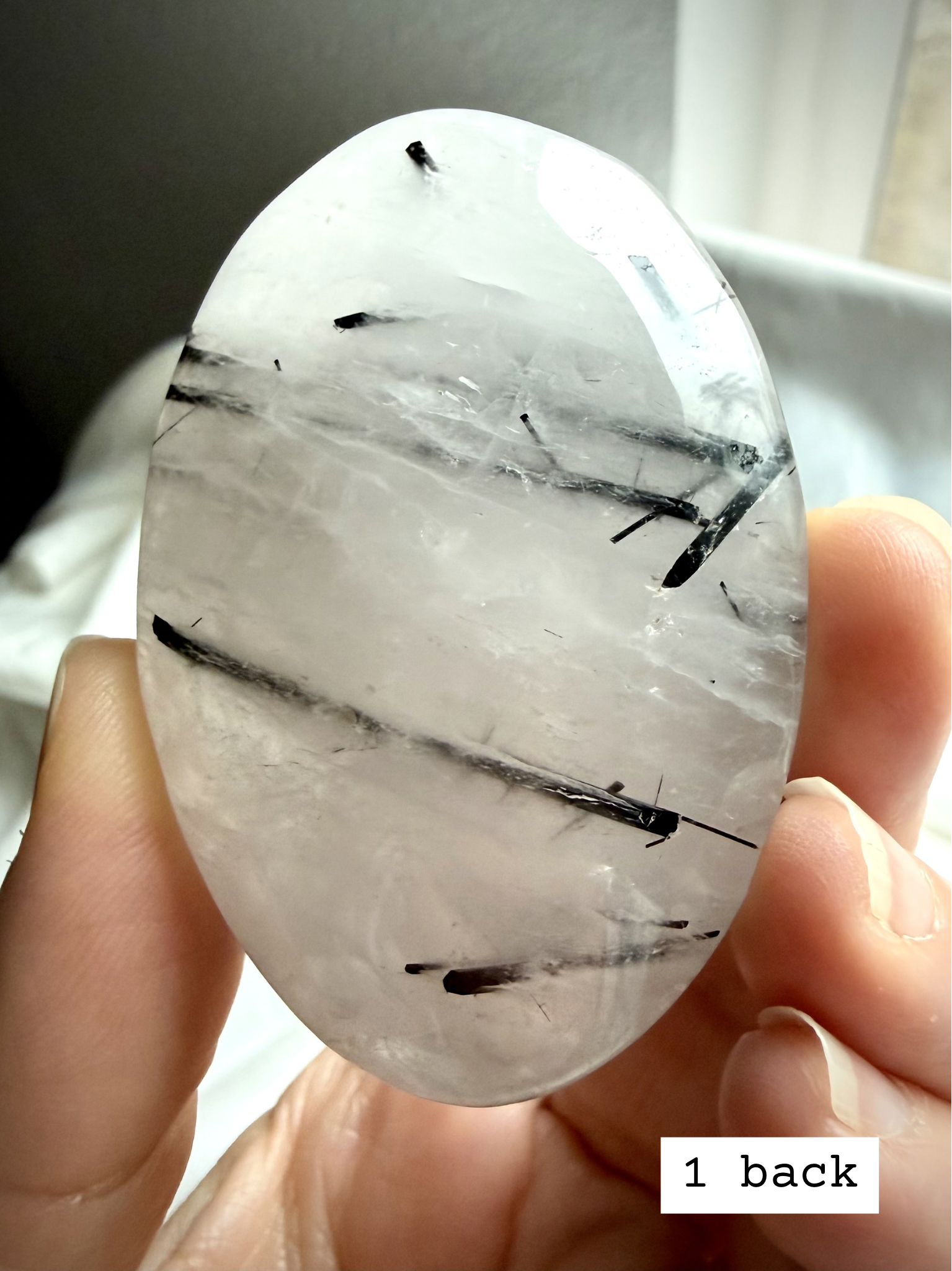 Black Tourmaline in Quartz palm stone 1 back view showing tourmaline inclusions in quartz