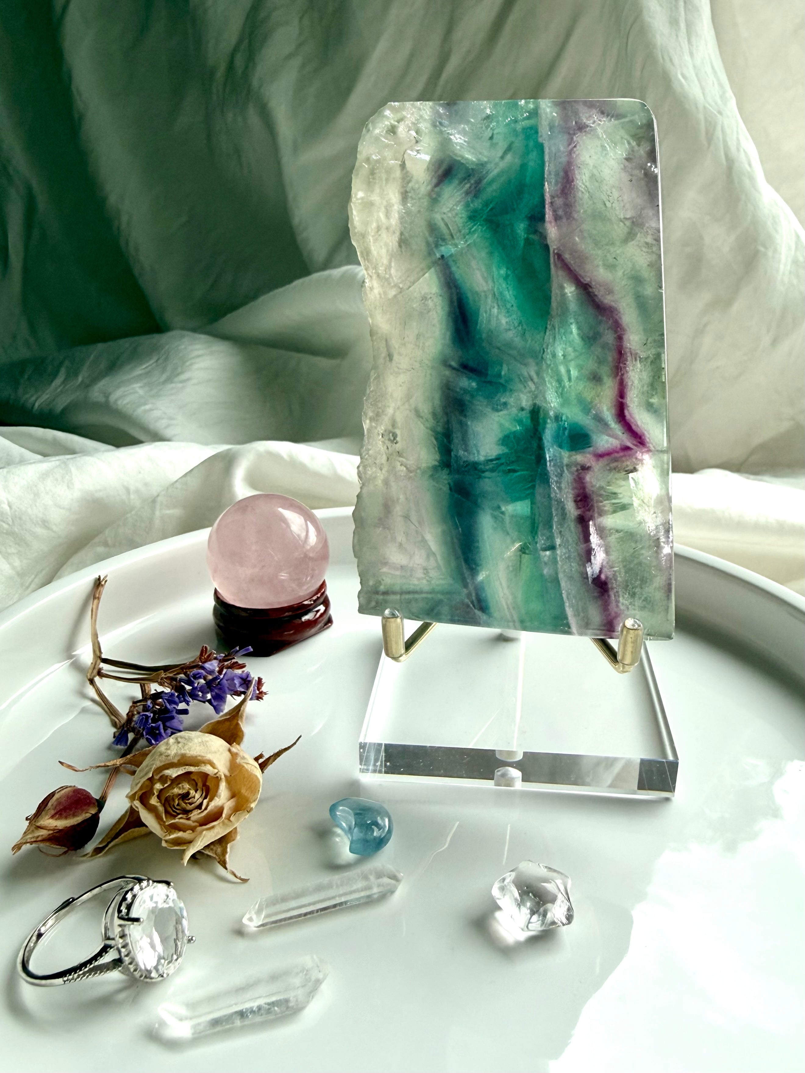 One of a kind rainbow fluorite slab on a stand with teal and purple banding – crystal for clarity, focus + energy balance