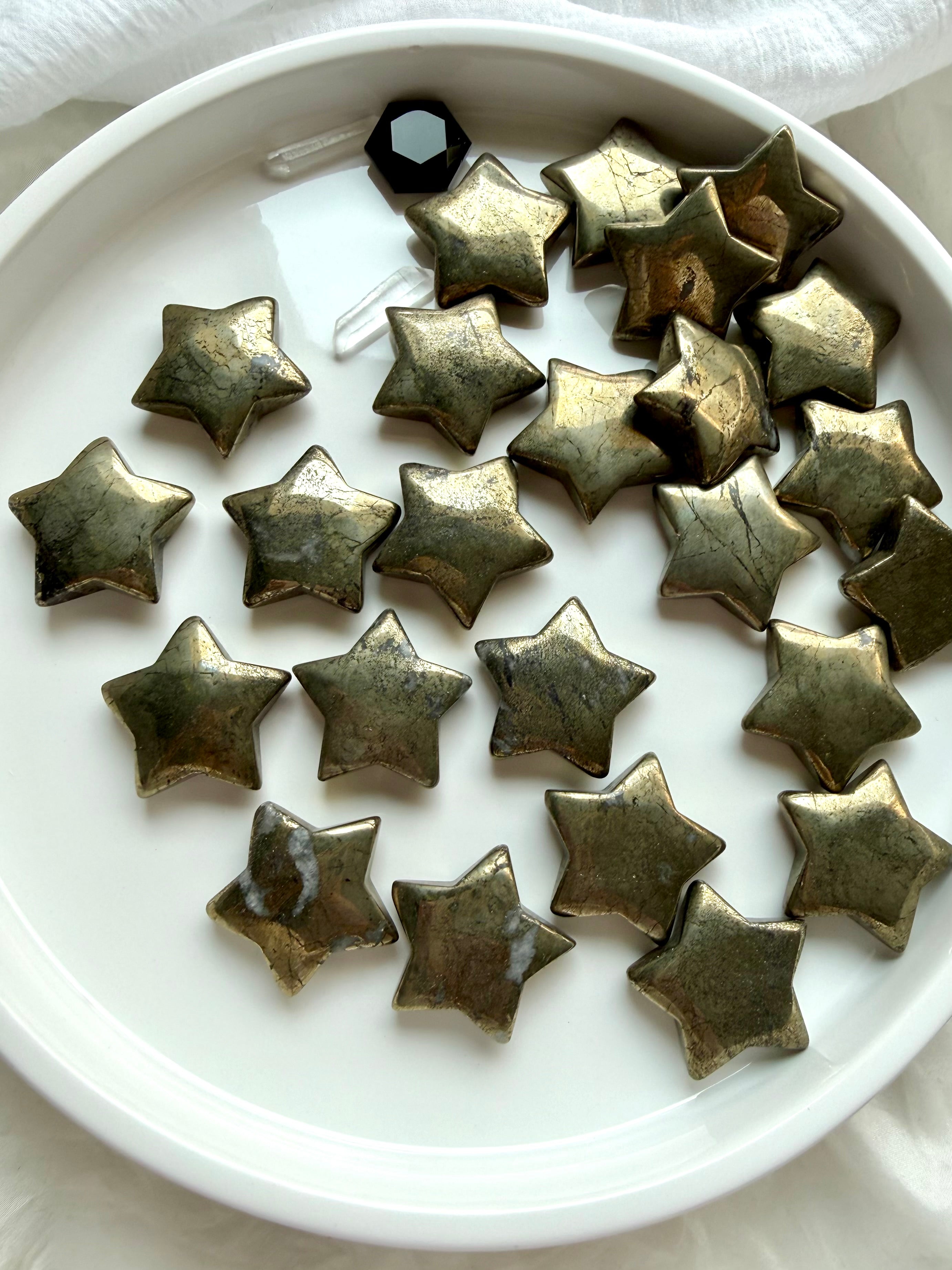 Pyrite star carvings with metallic gold luster for abundance, confidence and manifestation