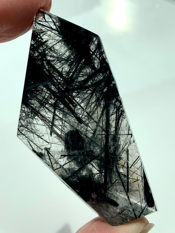 This high quality Black Tourmaline in Quartz polished Freeform Crystal Specimen would make a wonderful gift for any crystal collector.