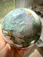 Moss Agate sphere with druzy Quartz pockets and organic patterns for grounding and abundance energy