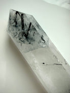 tourmalinated quartz DT crystal with black tourmaline needles and polished facets 
