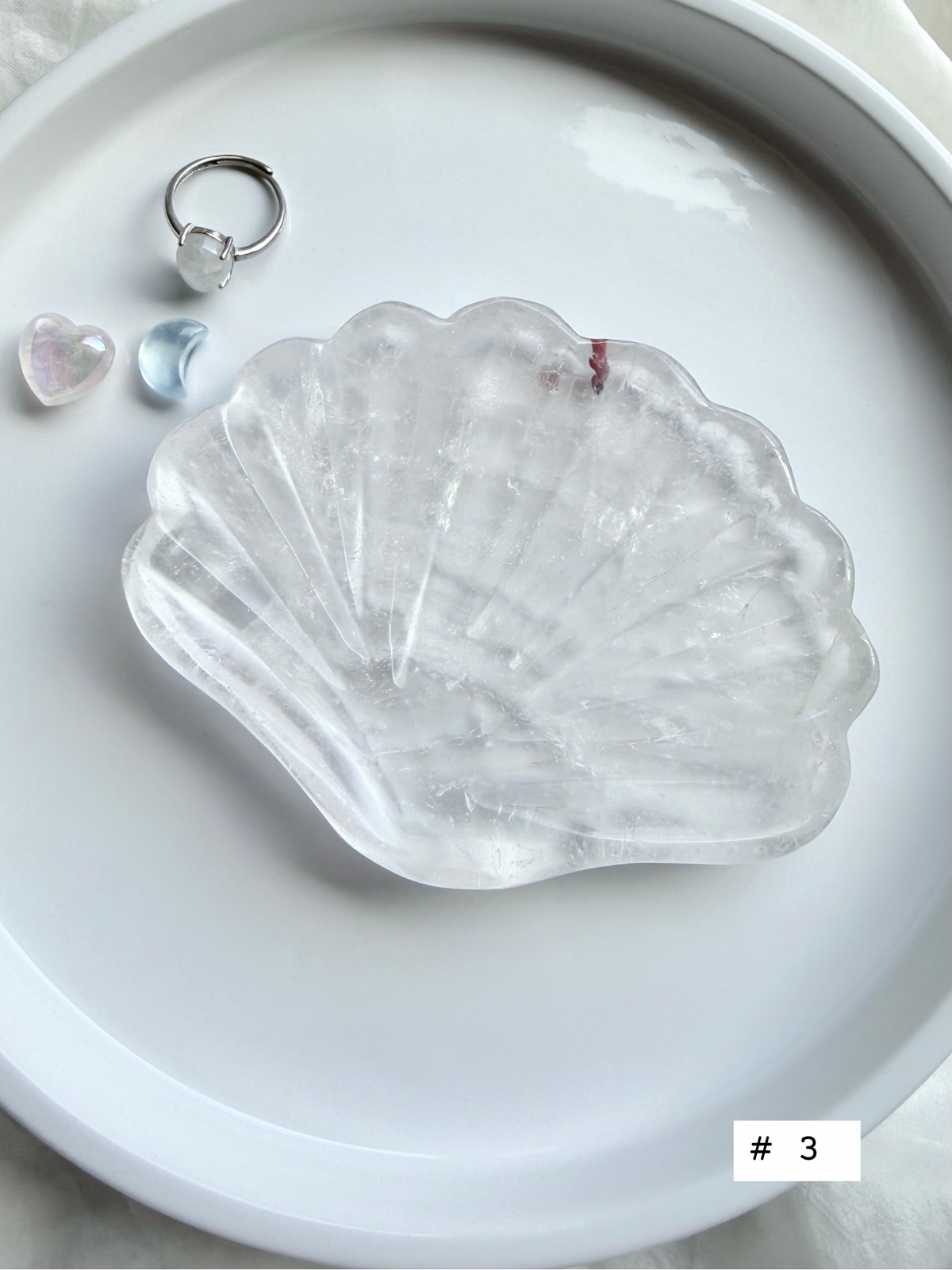 Clear Quartz shell bowl, individual piece #3, showing natural crystal patterns and polished scallop carving.