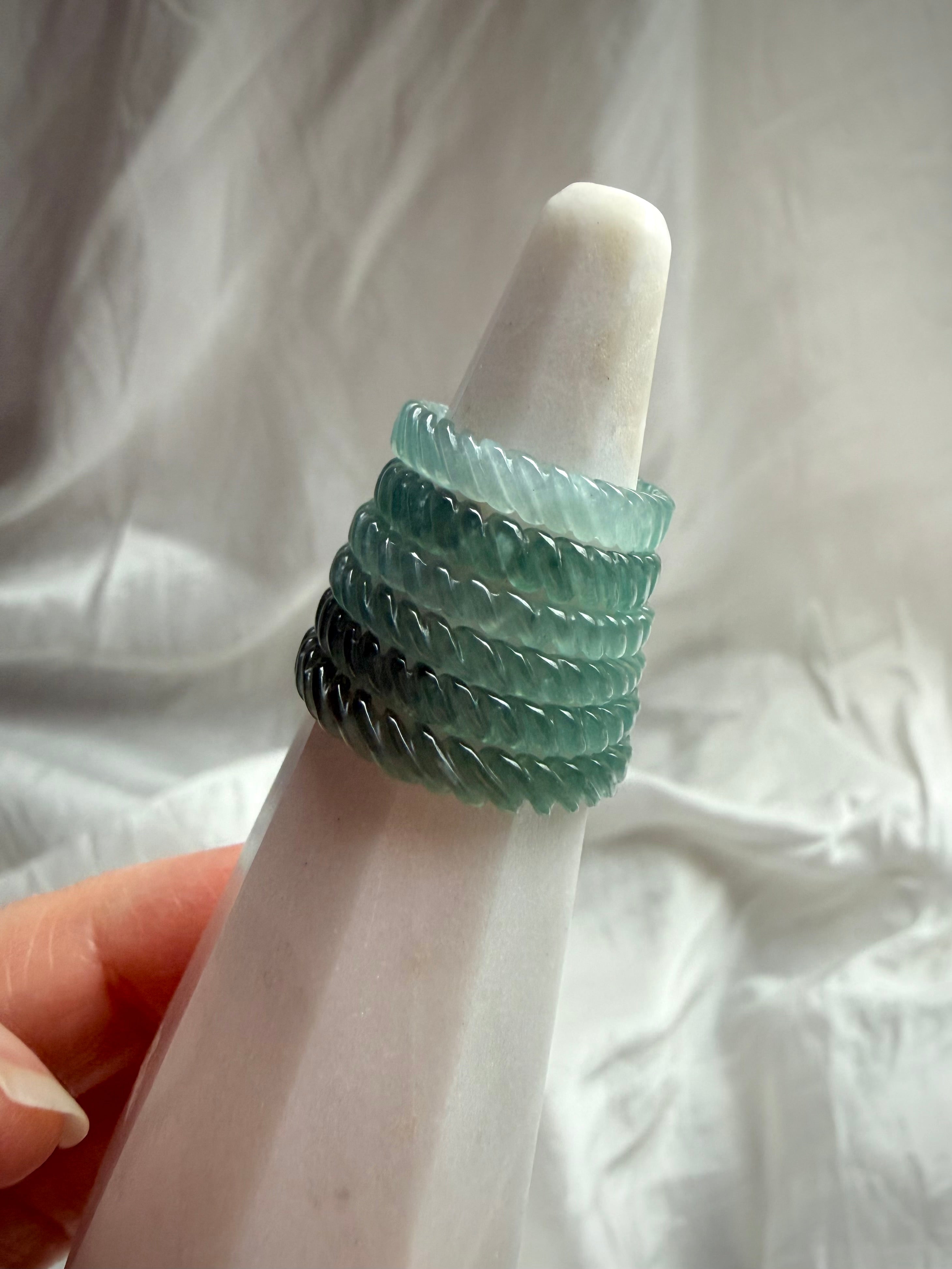 High-transparency Blue Water Jade woven ring with braided carving detail and smooth comfort-fit interior