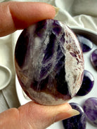 natural dream amethyst crystal palm stone with soft lavender tones