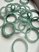 Collector-quality Blue Water Jade woven band rings with exceptional glow, premium jadeite carved in braided design