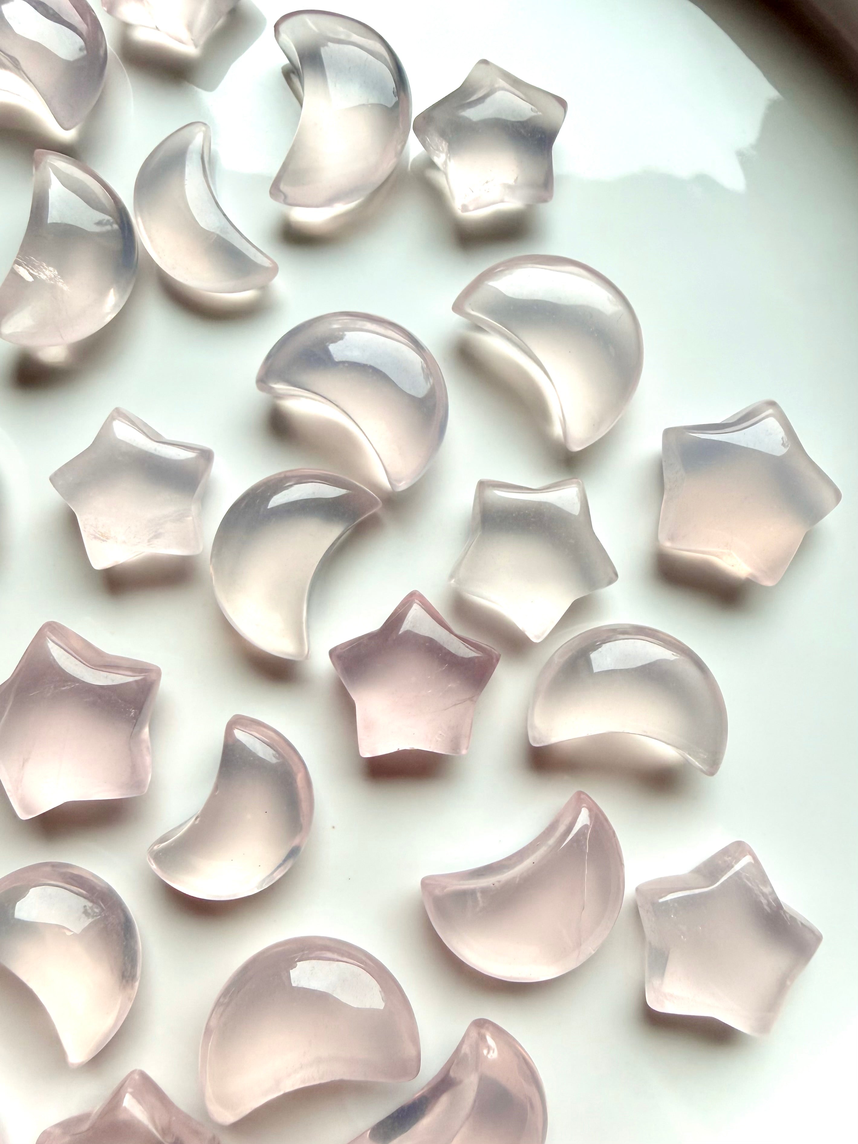 Rose Quartz mini moons and stars with soft pink translucence and natural variations in shape and clarity 