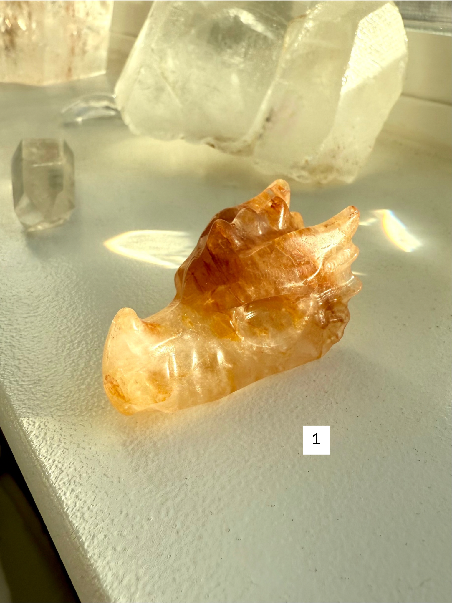 Polished Golden Healer Quartz dragon head carving in golden tones with natural veining — crystal totem for chakra alignment and meditation.