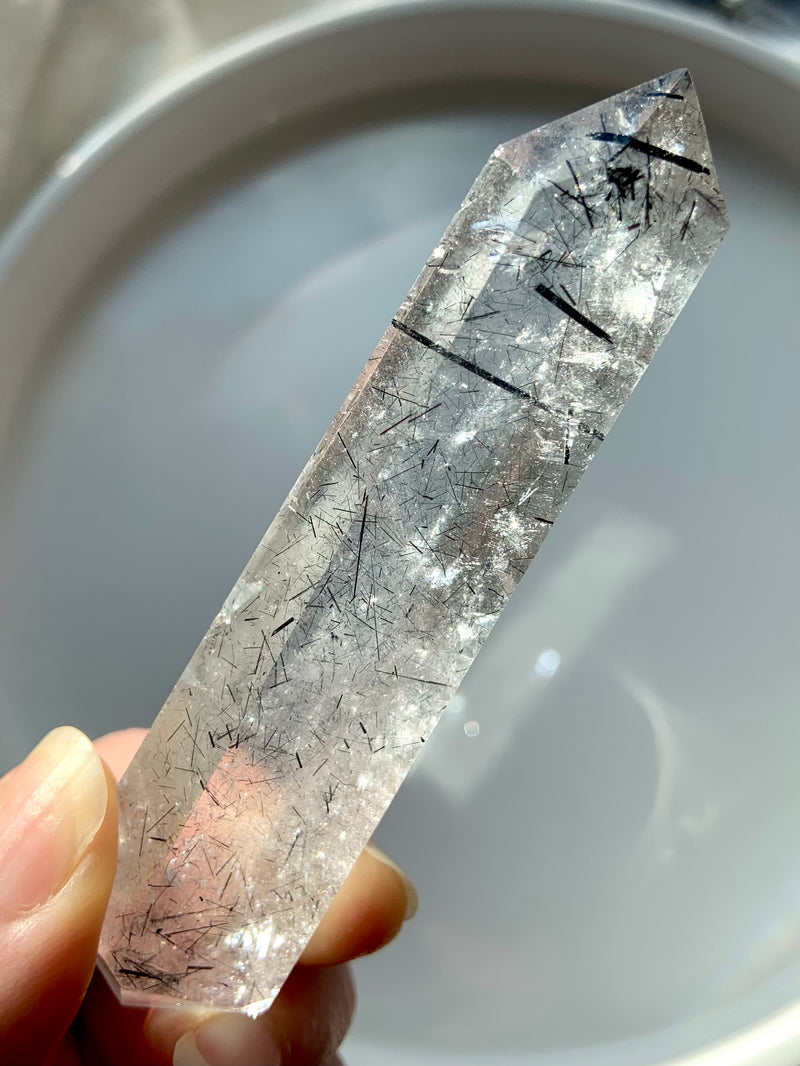 Double Terminated Black Tourmaline Rutilated Quartz, Polished Tourmalated Quartz DT shown in natural light on a light background