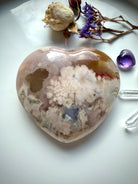 Pink Amethyst Flower Agate heart displayed with dried flowers, Amethyst mini heart, and Quartz points