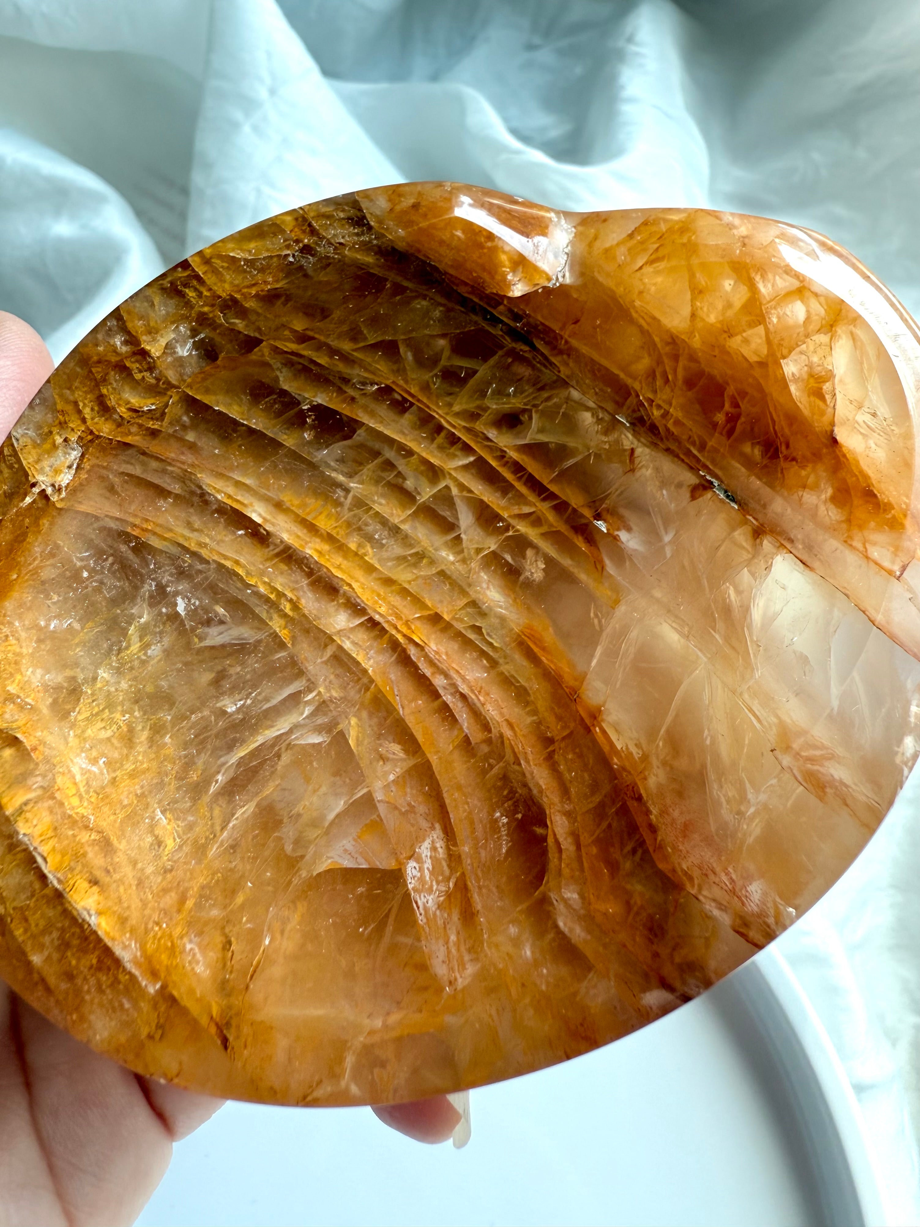Close-up of Golden Healer Quartz showing golden iron inclusions and natural patterning of the crystal bowl