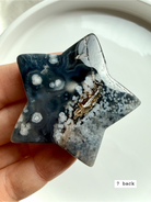 black flower agate star carving #7 back showing organic mineral inclusions and smooth polish