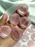 rose quartz heart worry stones shown on hand for scale – polished crystal thumb stones for meditation and emotional support