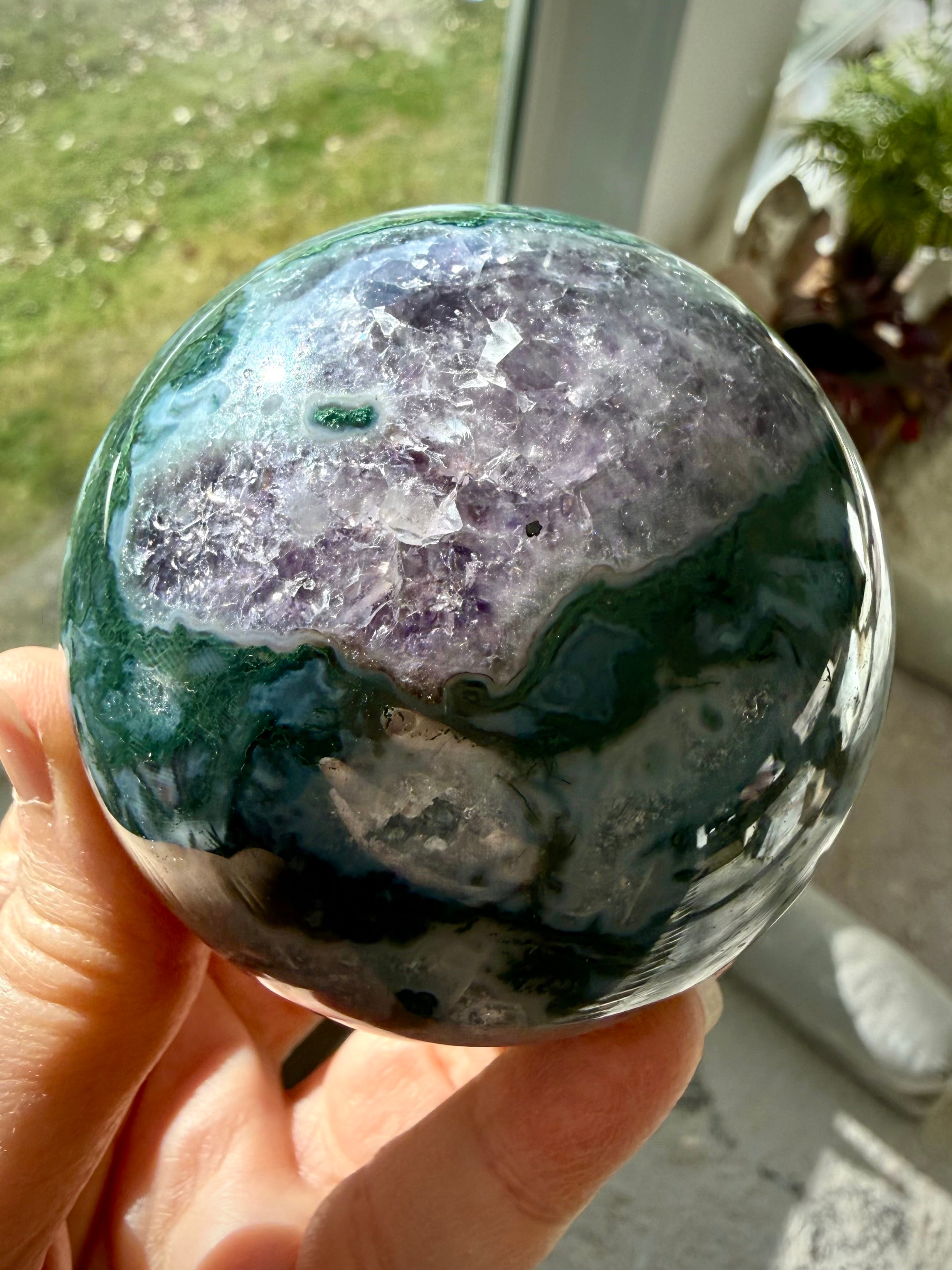 Moss Agate sphere with Amethyst druzy crystal pockets and natural green, purple, and white patterns