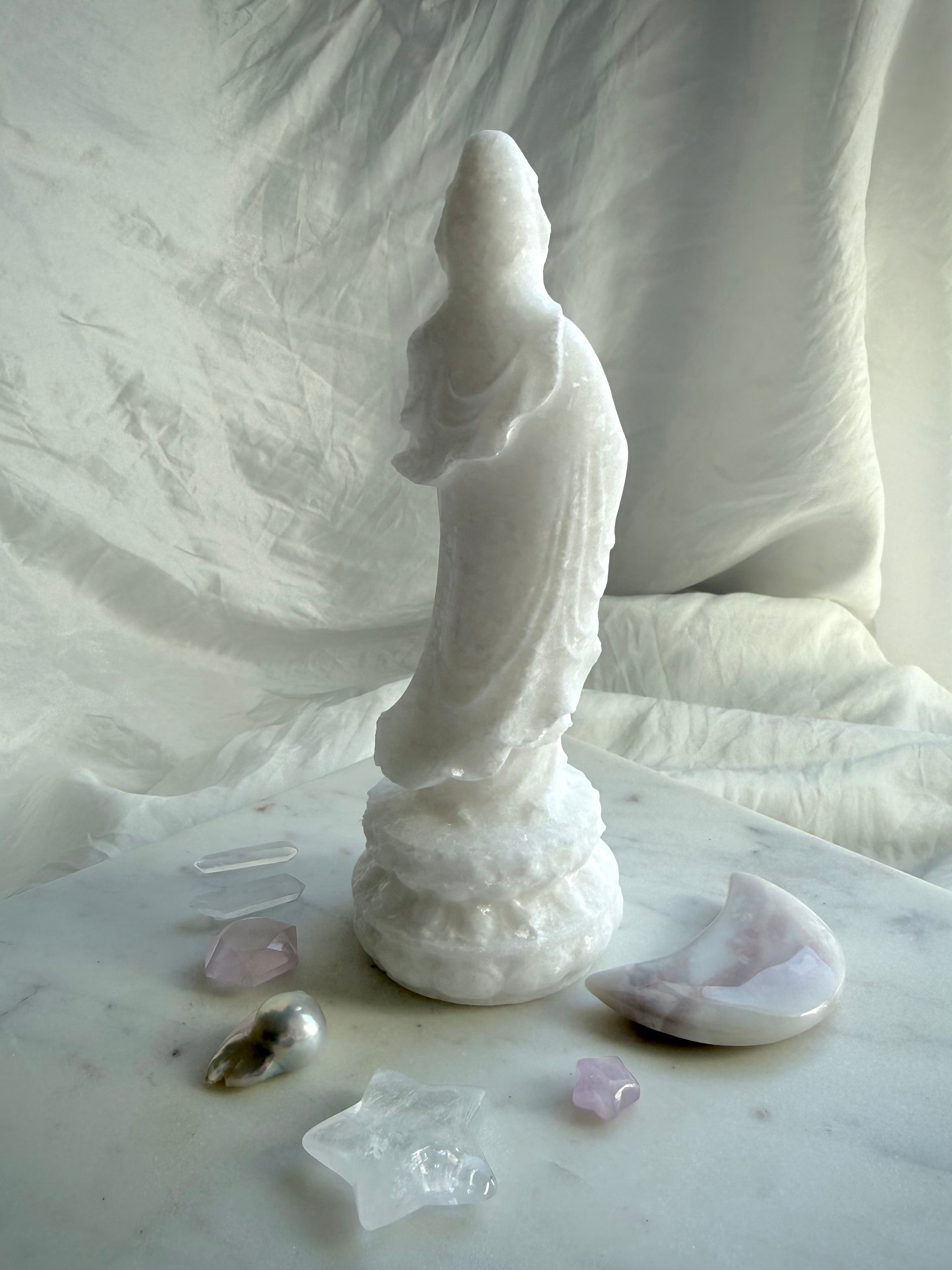 Back view of White Jade Standing Goddess carving highlighting flowing robes and craftsmanship
