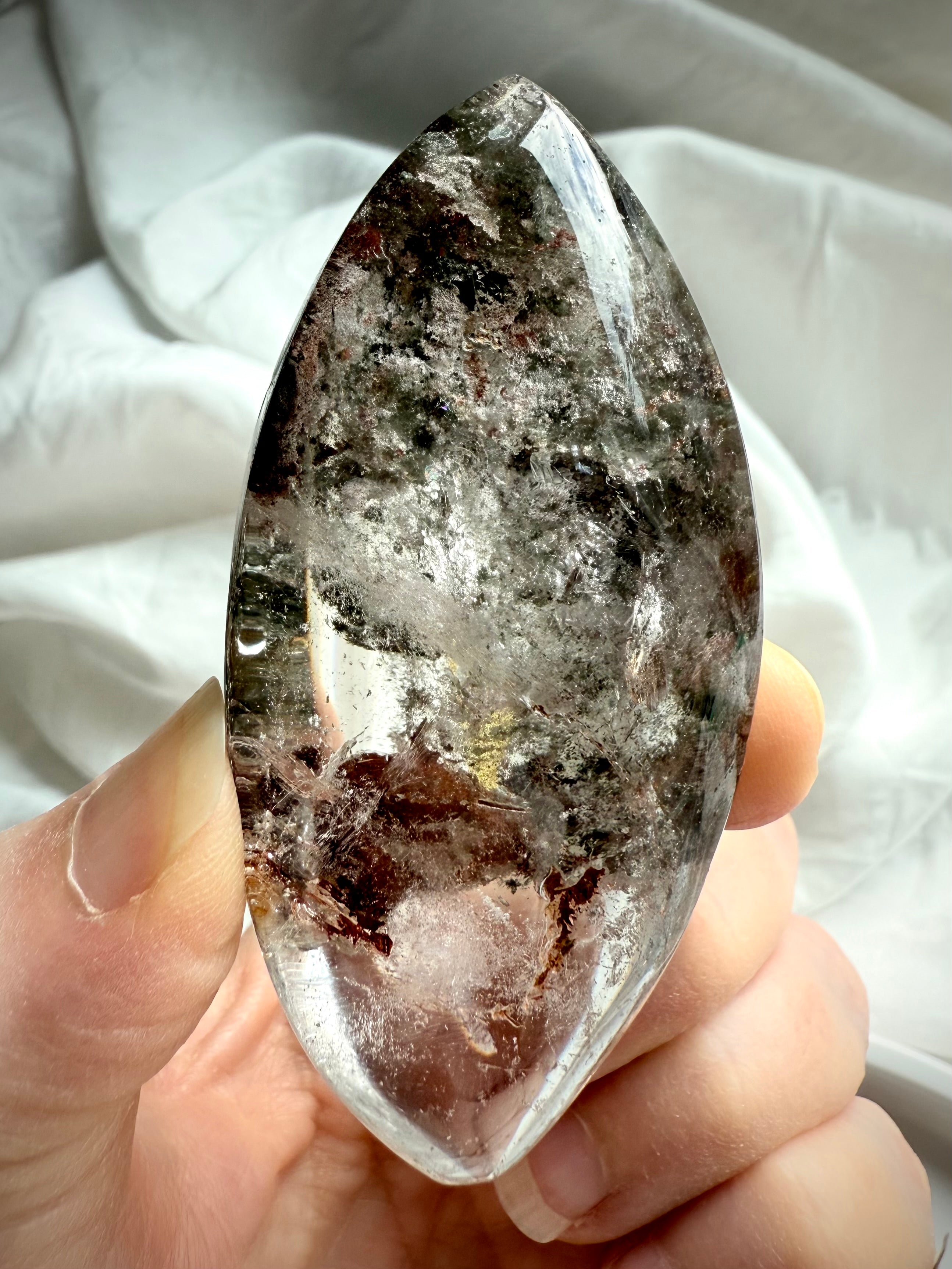 Polished Garden Quartz marquise revealing layered mineral landscape and internal clarity