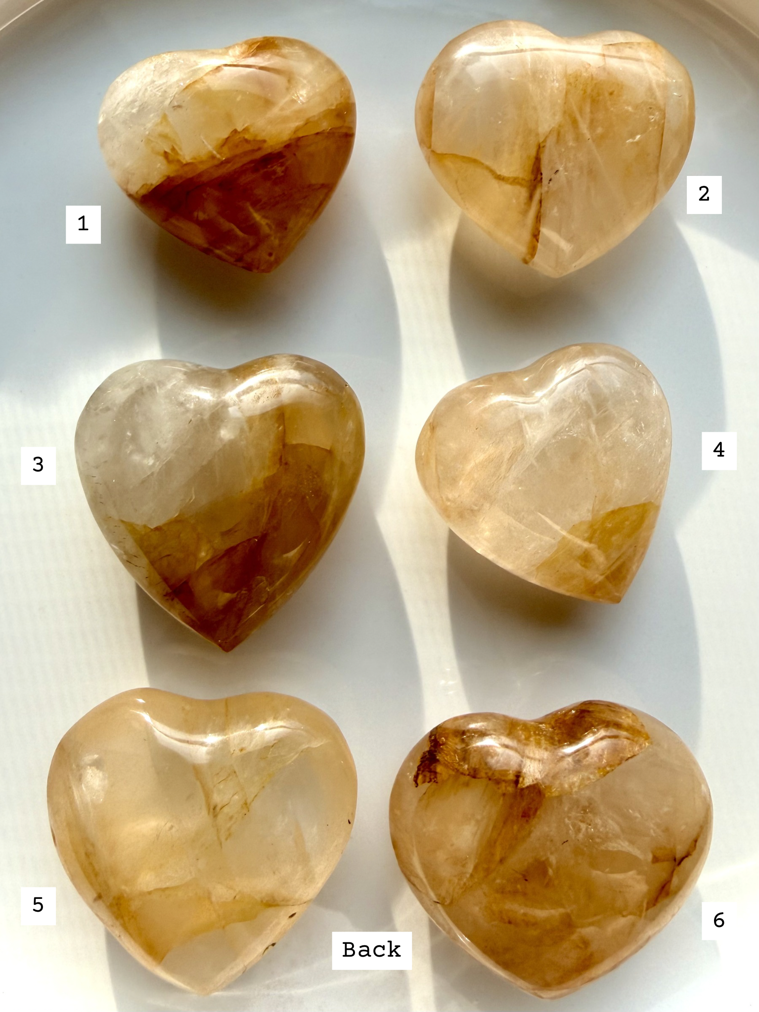 golden healer quartz hearts labeled 1–6 back view showing natural veils inclusions and variation in each piece