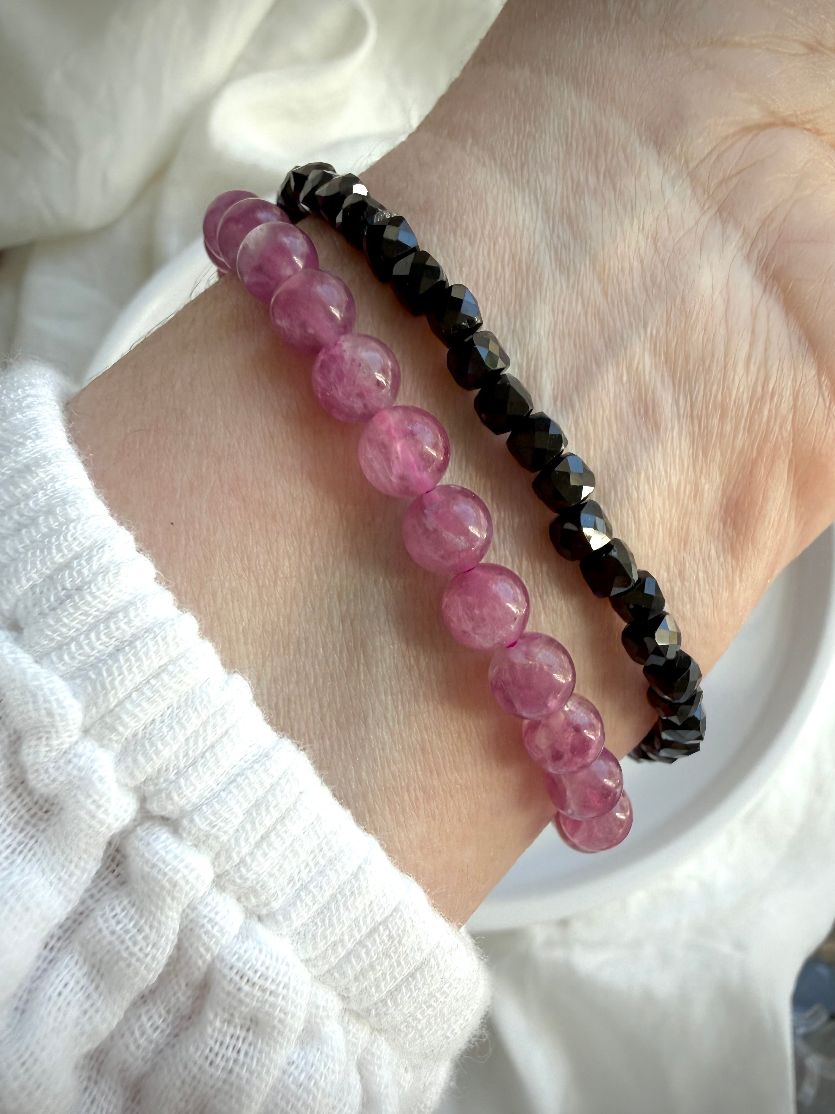 Pink Tourmaline bracelet paired with our faceted Black Spinel bracelet for a sophisticated pink and black gemstone stack