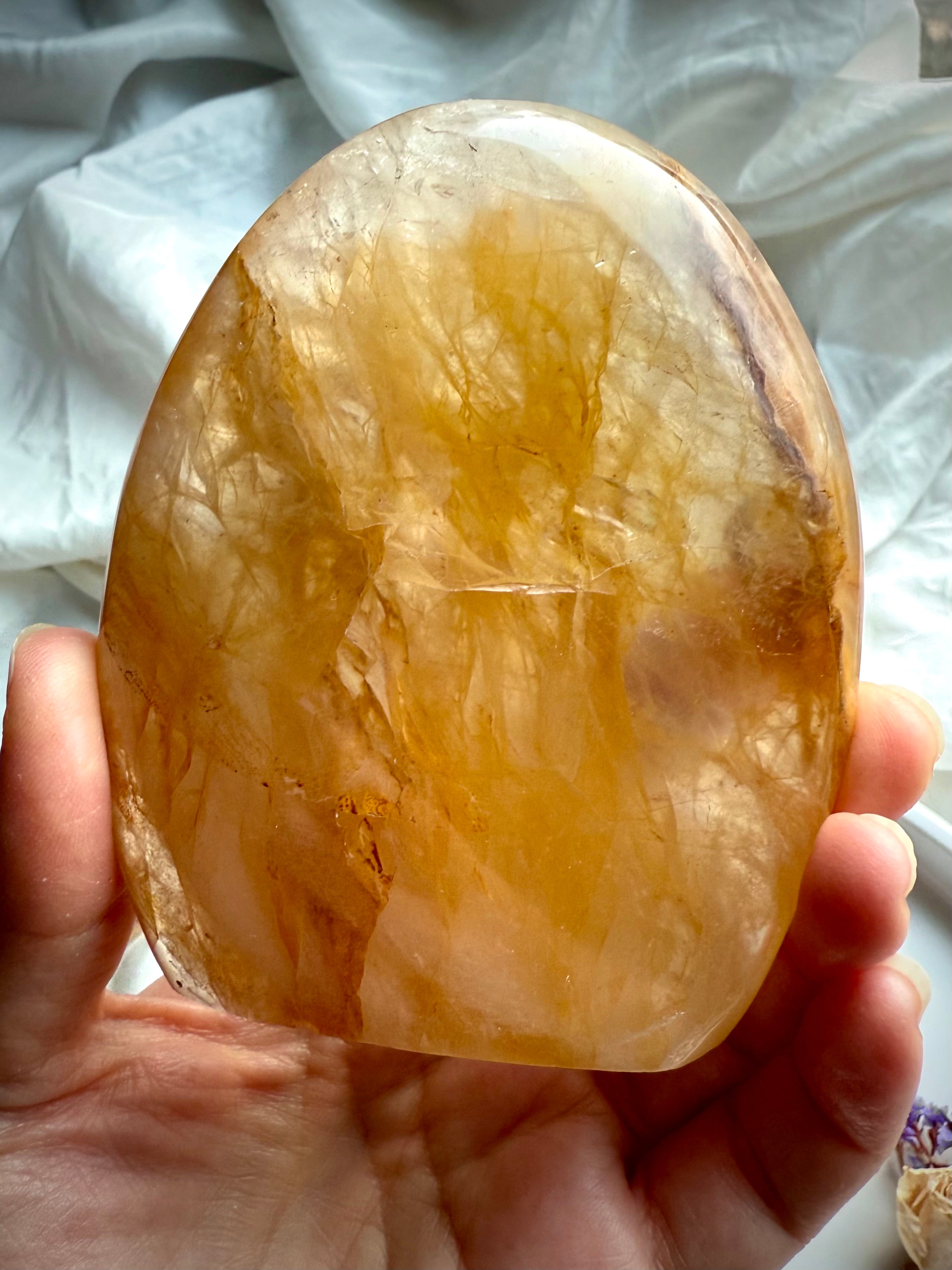 Luminous Golden Healer Quartz freeform with warm golden translucence and polished display shape