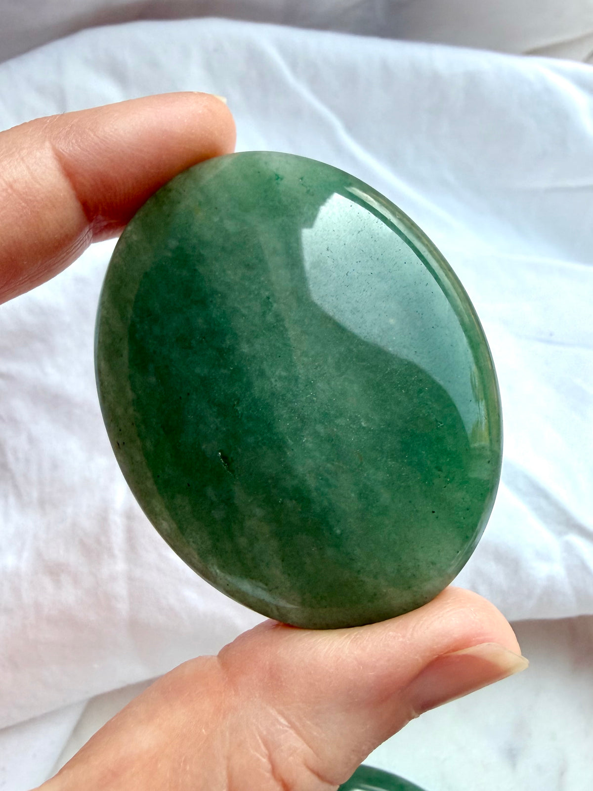 Polished Green Aventurine palm stone with rich leafy green color and subtle natural aventurescence