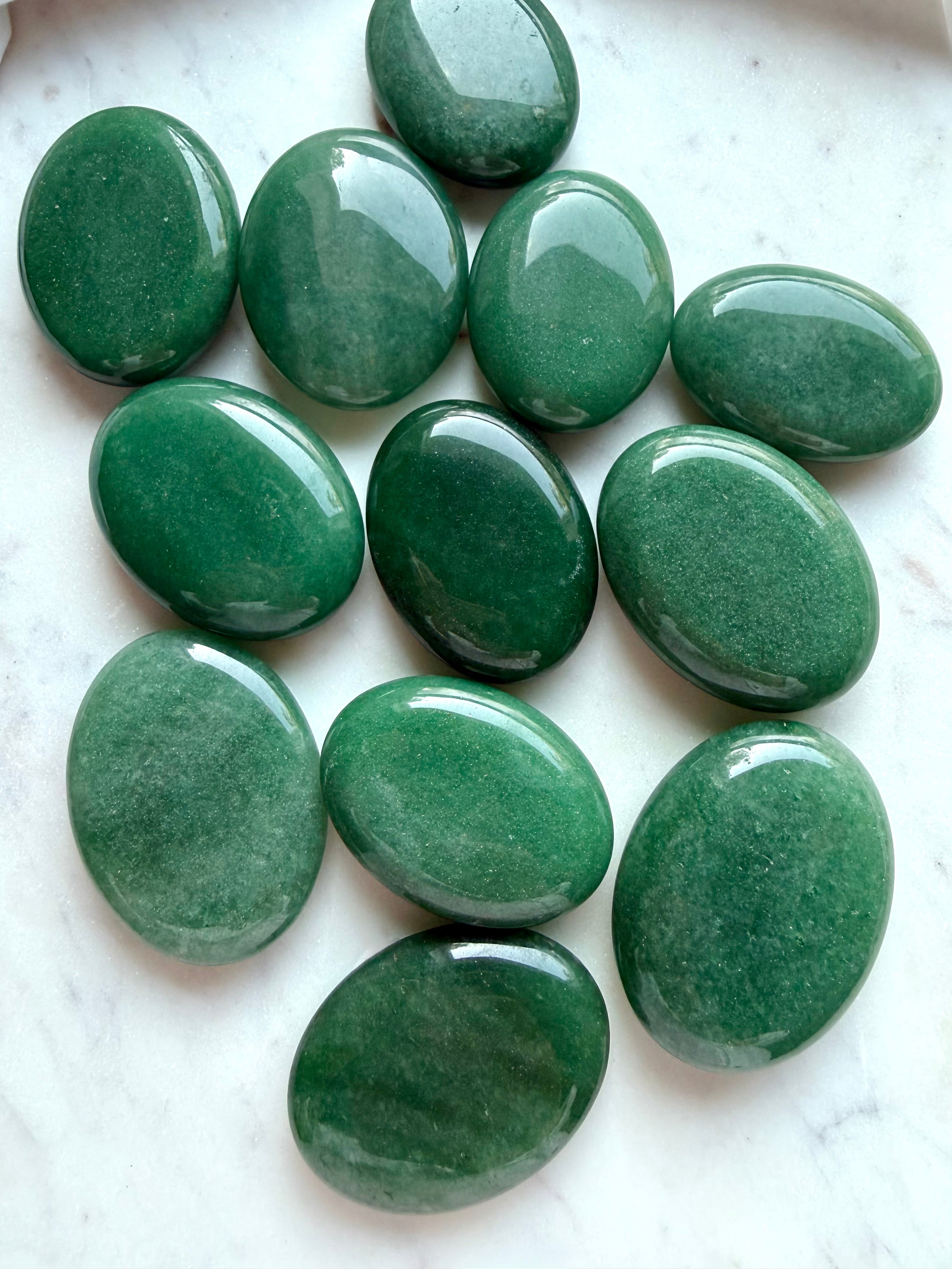 Polished Green Aventurine palm stones with natural green color variation and subtle sparkling aventurescence