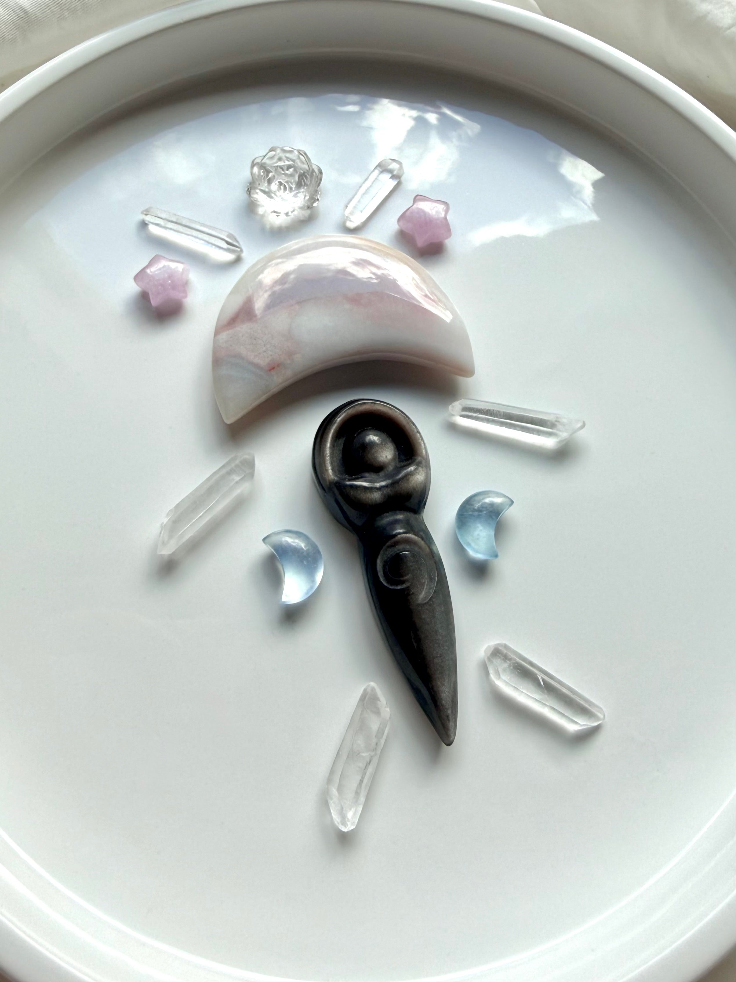 Crystal grid with Silver Sheen Obsidian goddess, Aquamarine moons, Kunzite stars and Clear Quartz points