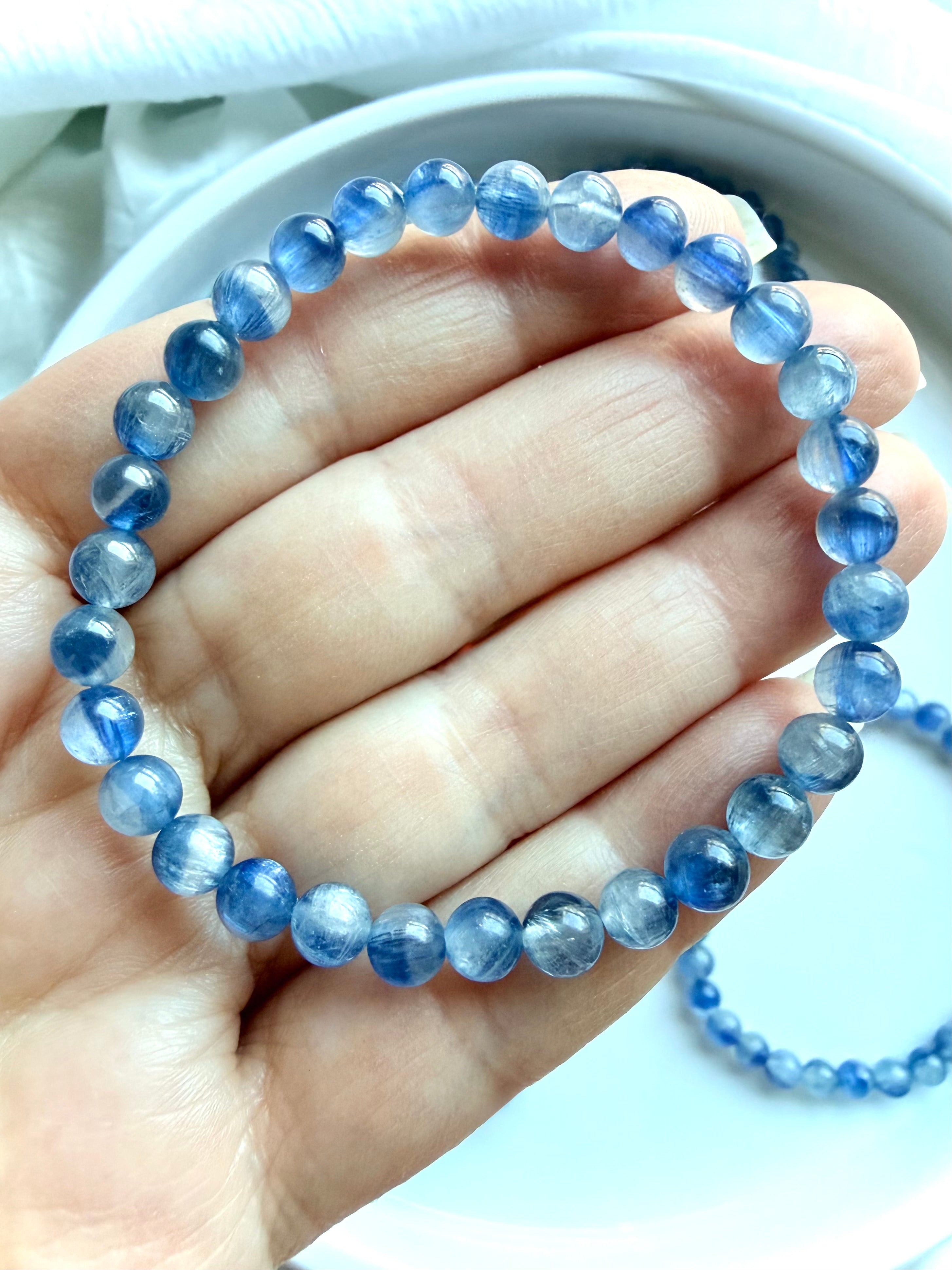 Blue Kyanite crystal bracelet showcasing luminous natural gemstones with layered blue color variation