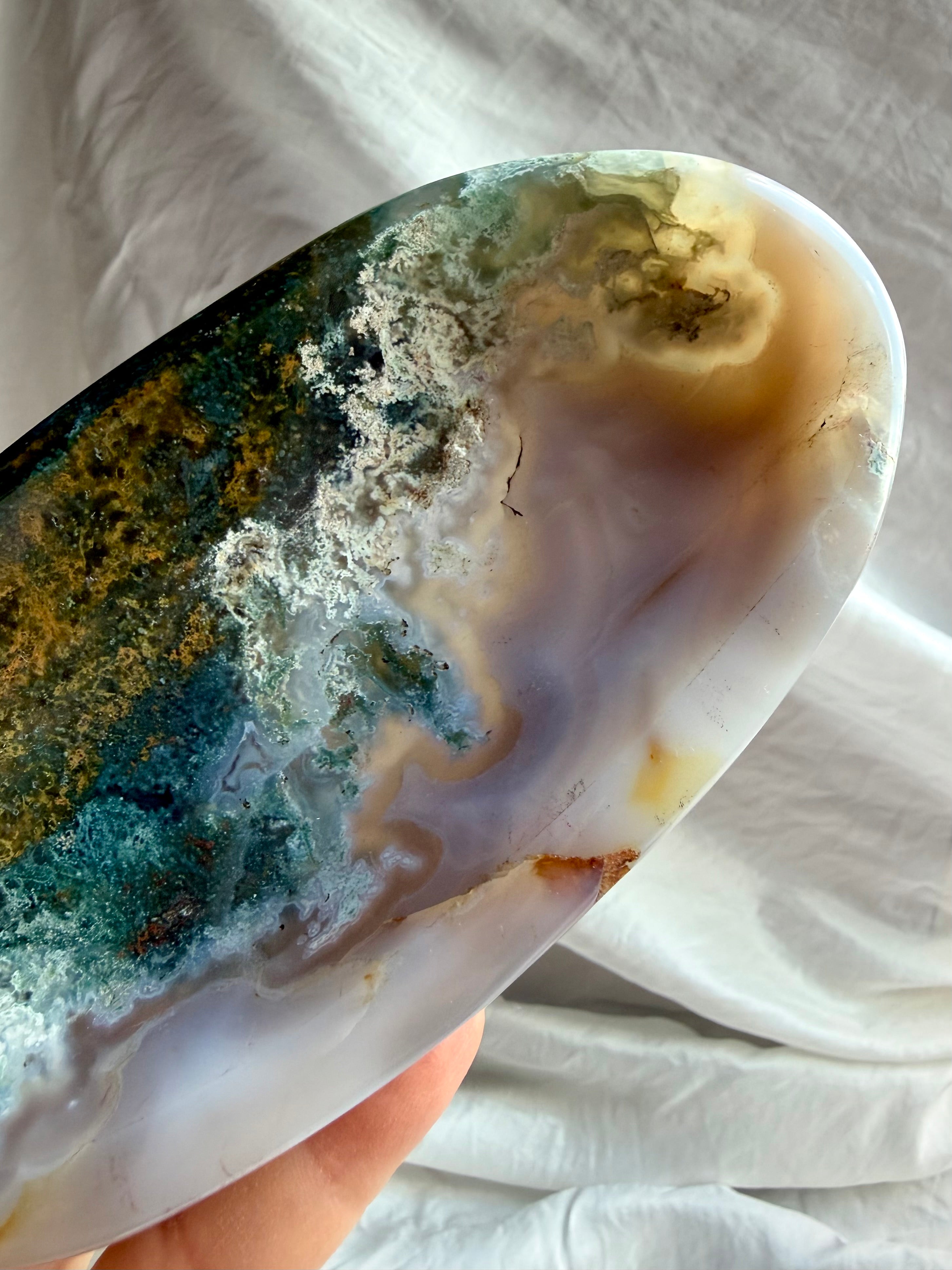 Natural Moss Agate bowl with green moss-like inclusions, white agate banding and translucent patterns for grounding and renewal