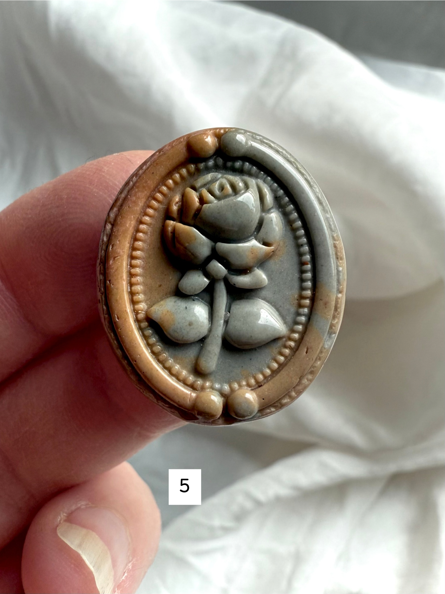 Polychrome Jasper Rose cabochon #5 showing sage green, tan, and natural stone banding