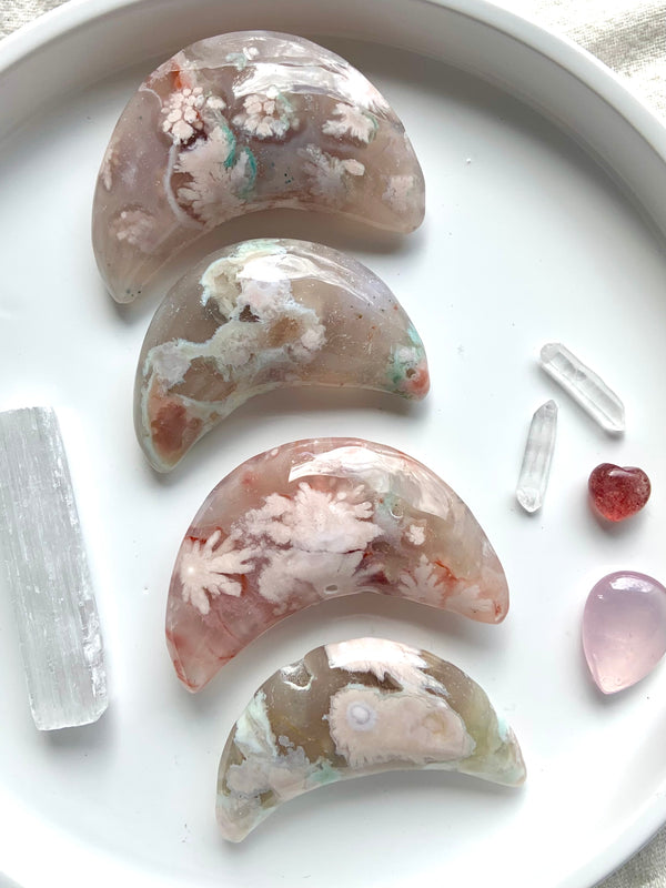 Pick your favorite! These Hand Carved Flower Agate Crescent Moons are one of a kind with gorgeous colors + patterns