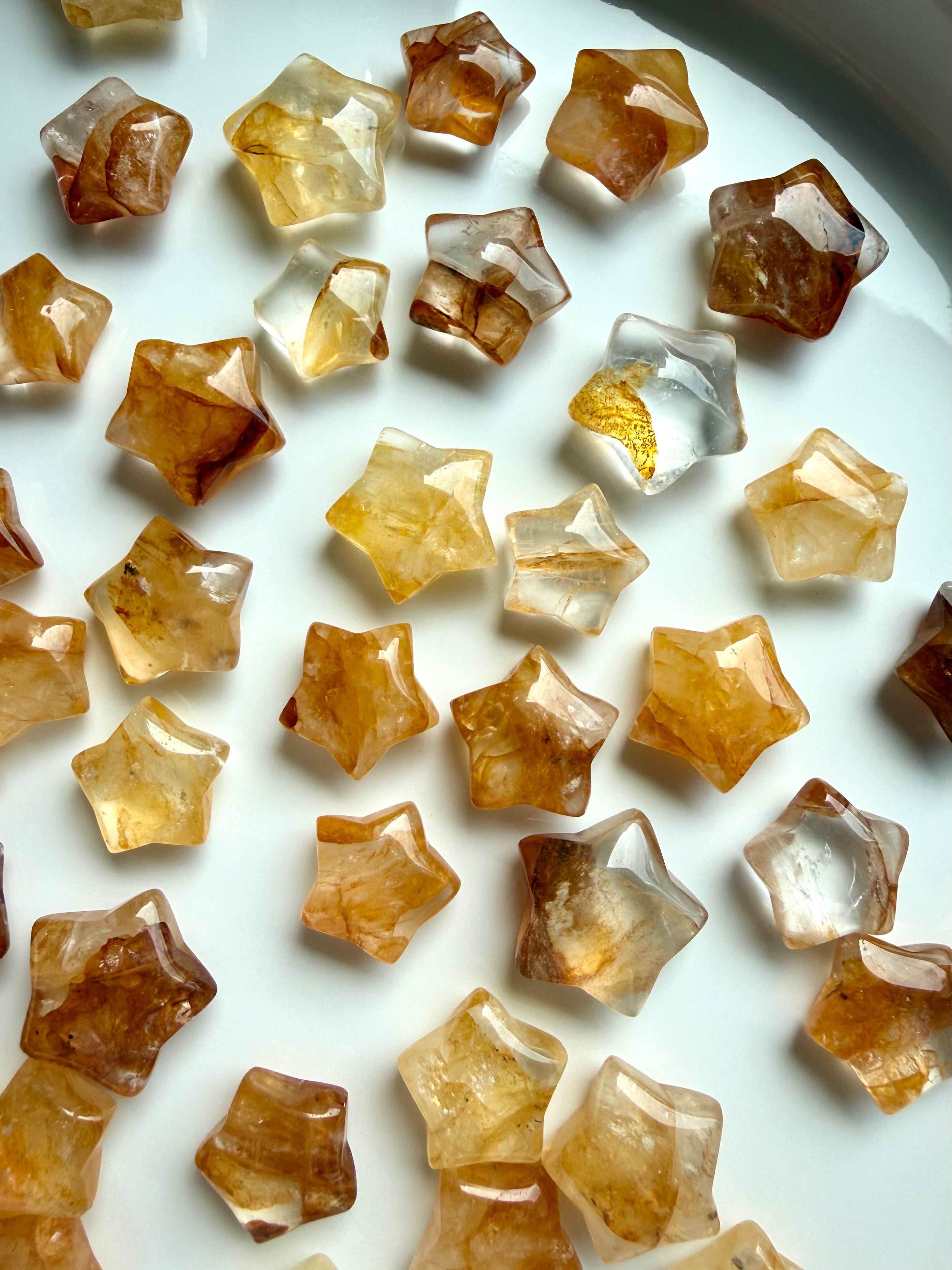 Golden Healer Quartz mini crystal stars with bright golden energy for intention setting and spiritual practices