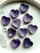 Mini Lepidolite heart bowls in lavender and purple with natural mica shimmer and heart-shaped crystal dish design