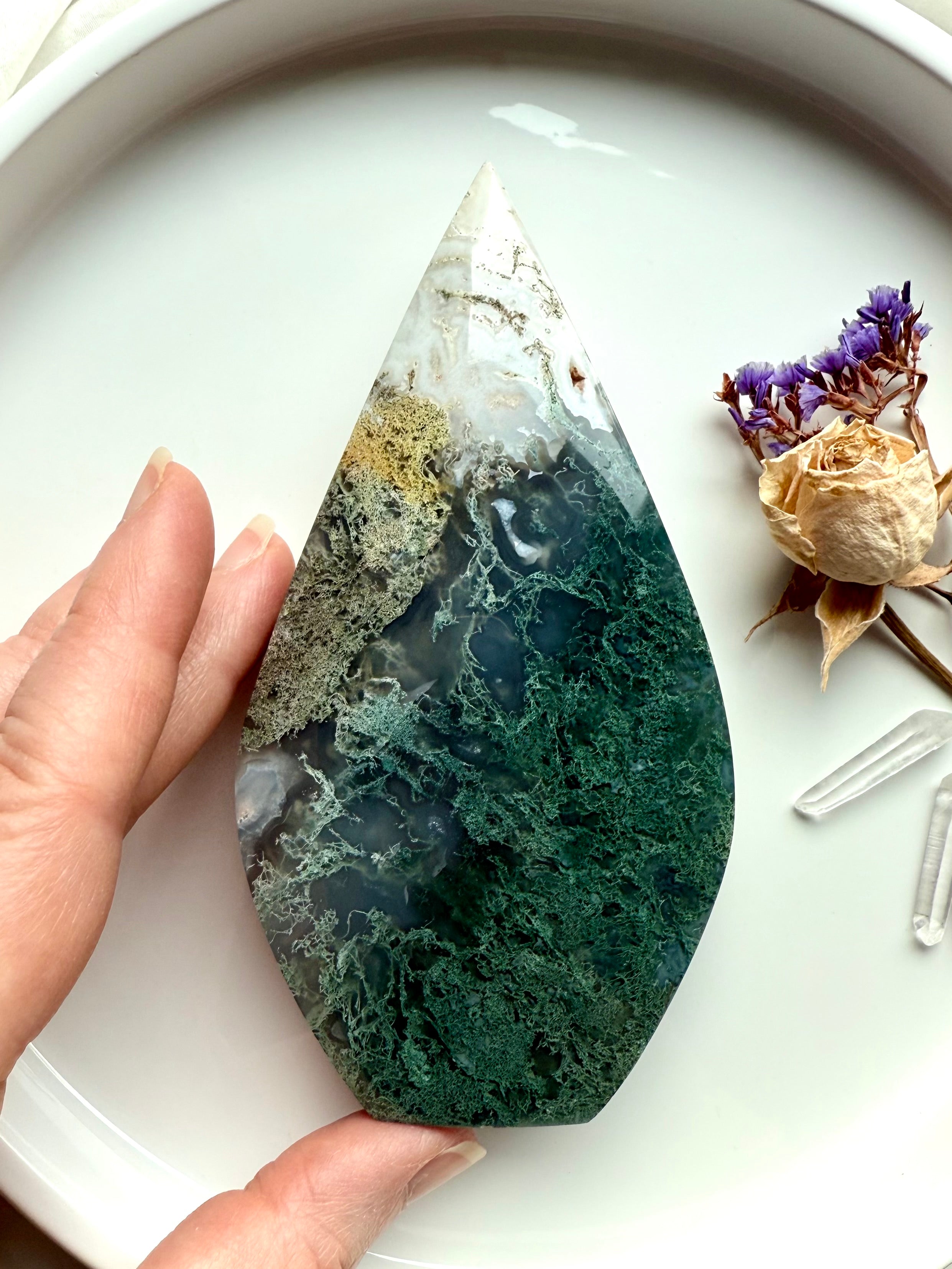 Moss Agate flame crystal with ombré green coloration and moss-like chlorite inclusions, grounding altar display